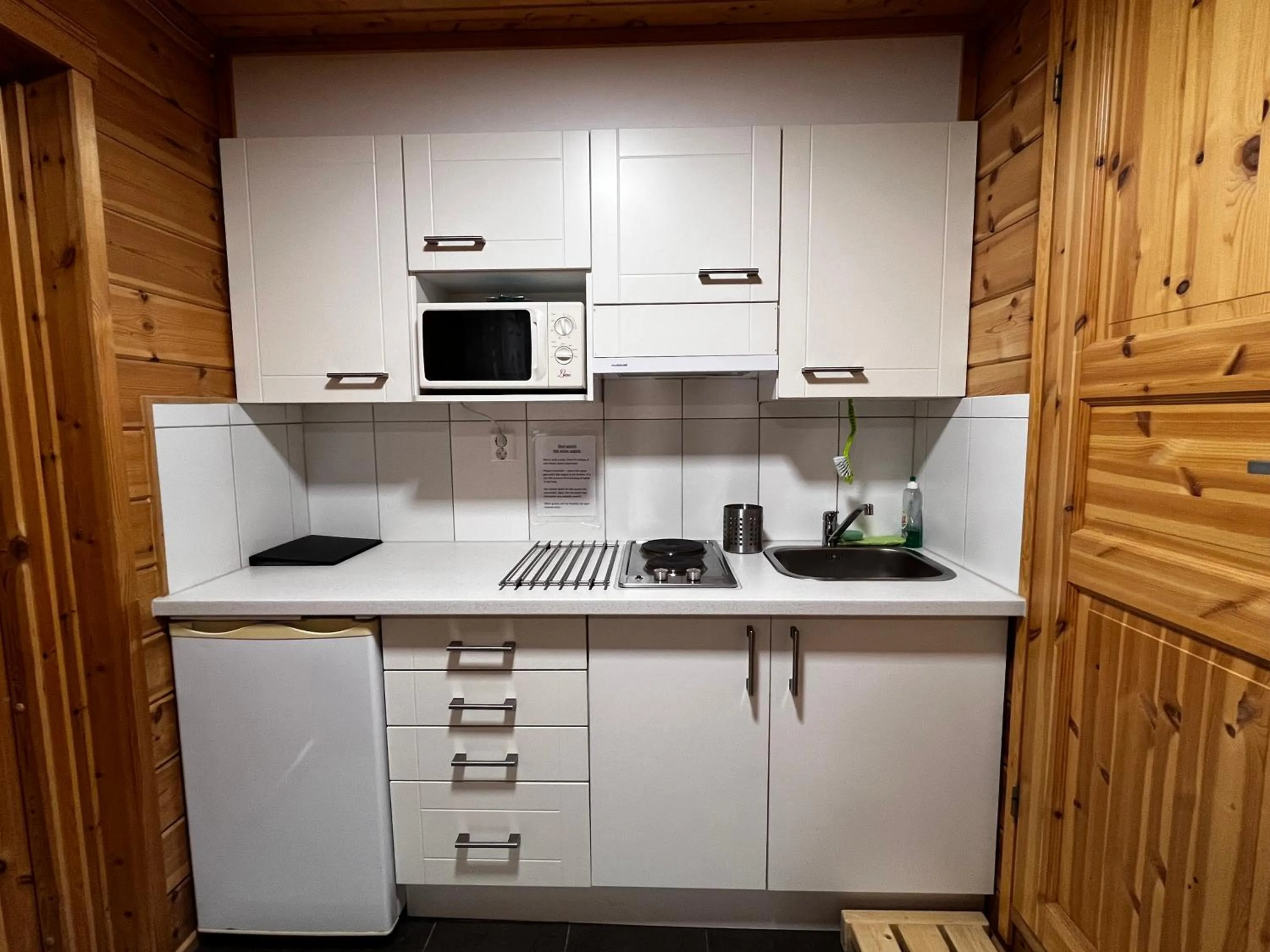 Kitchen or kitchenette in Motelli Rovaniemi