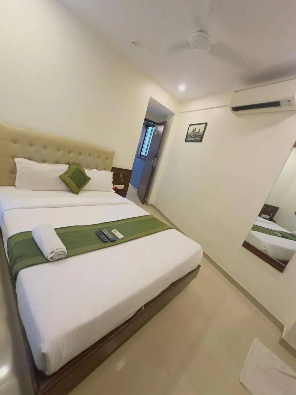 Bed in Hotel Mumbai International