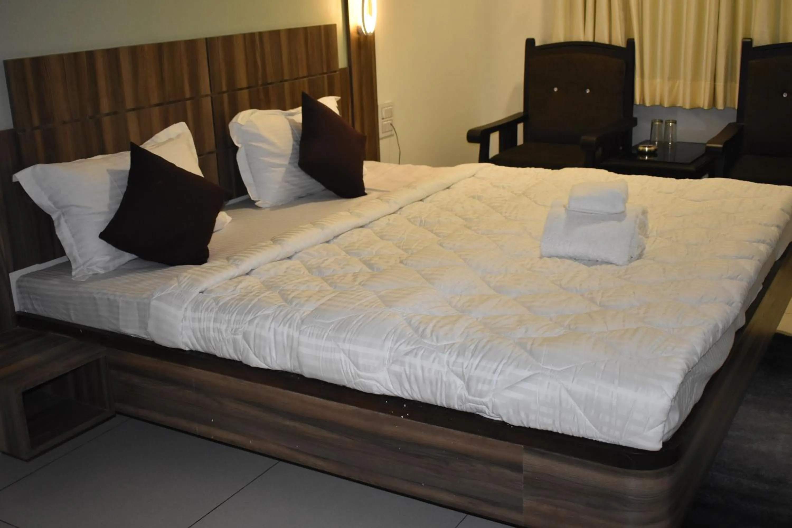 Bed in Hotel Shyam Palace