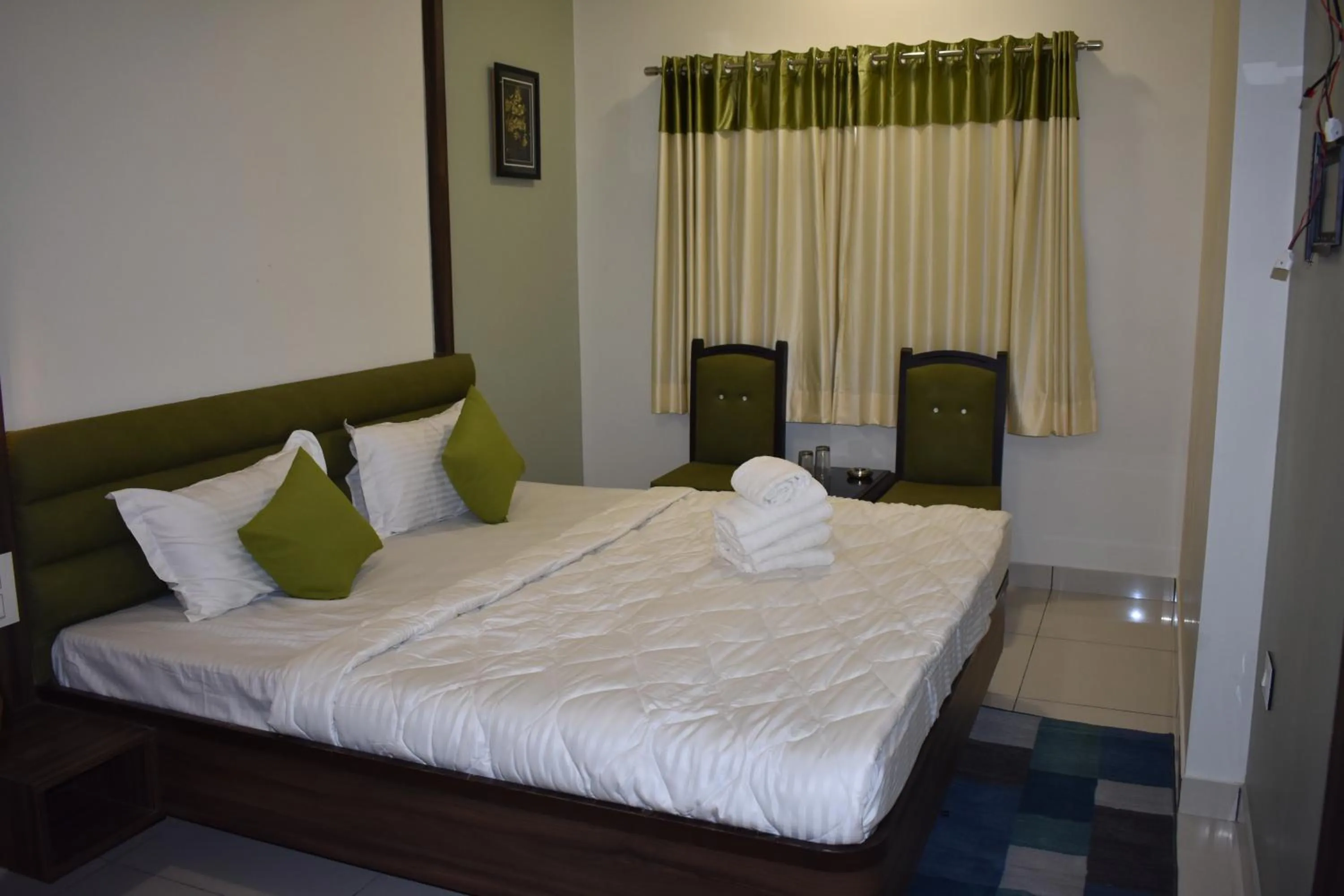 Bed in Hotel Shyam Palace