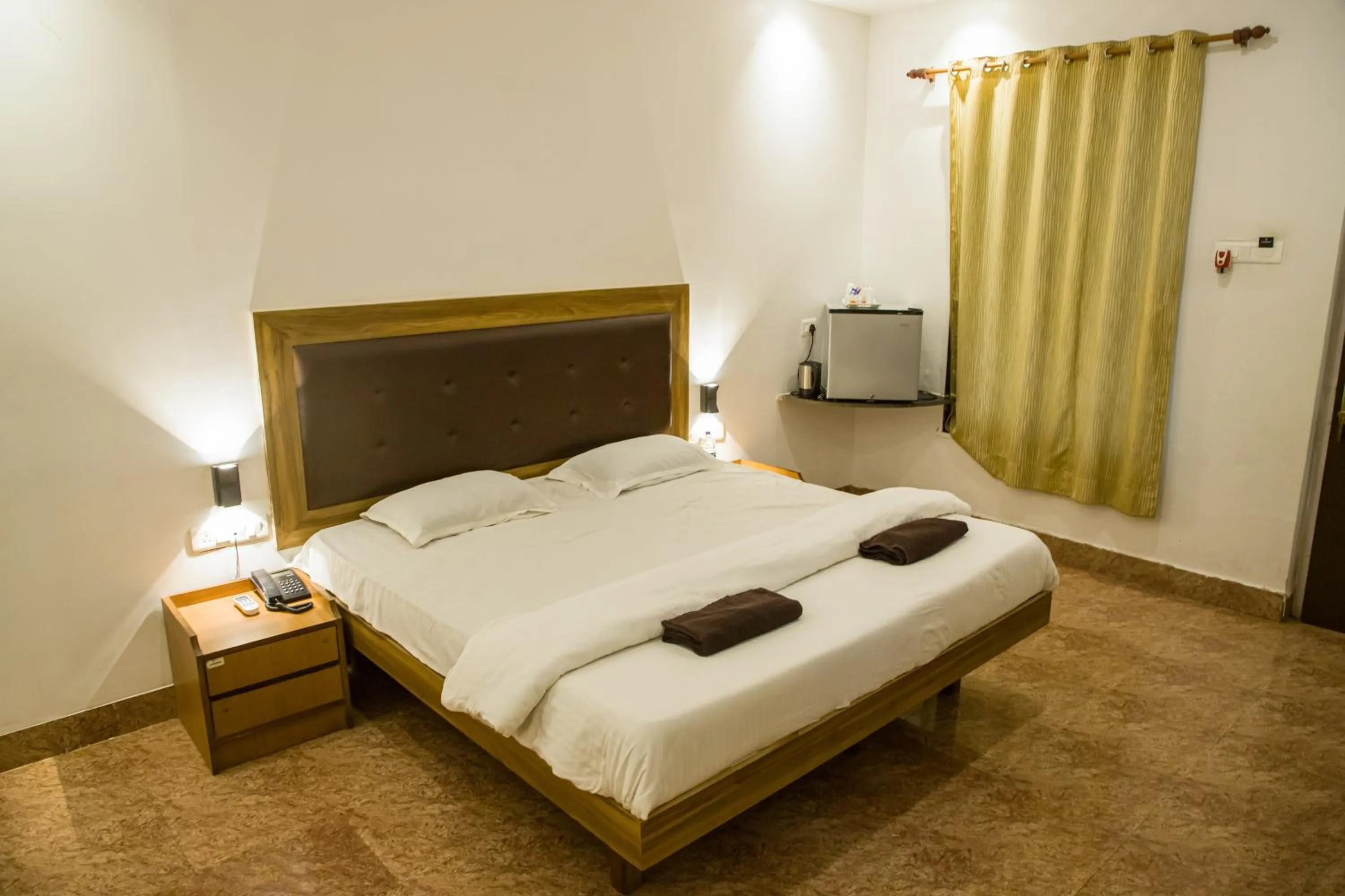 Bed in Sanidhya Beach Resort & Spa