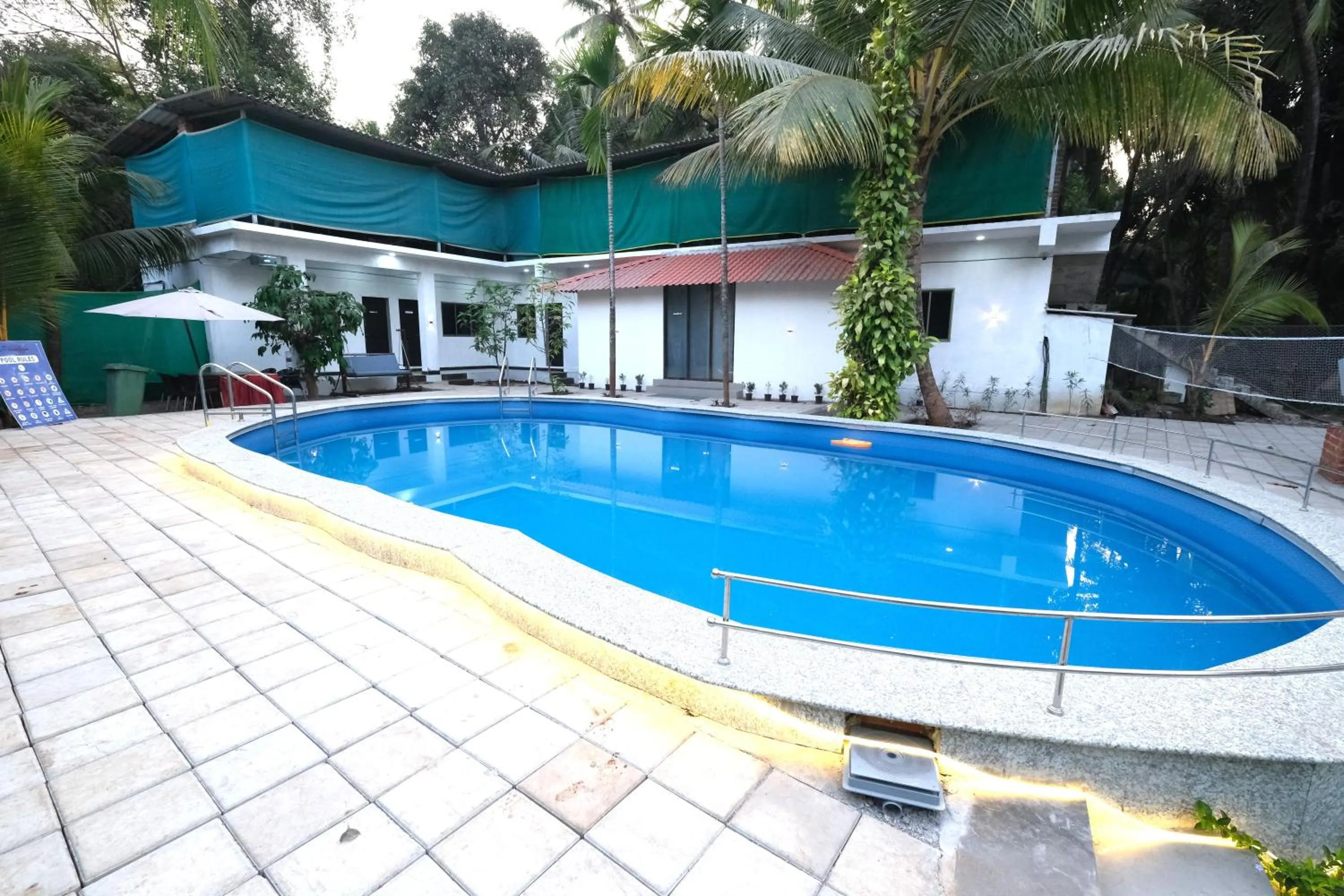 Swimming pool in Sanidhya Beach Resort & Spa