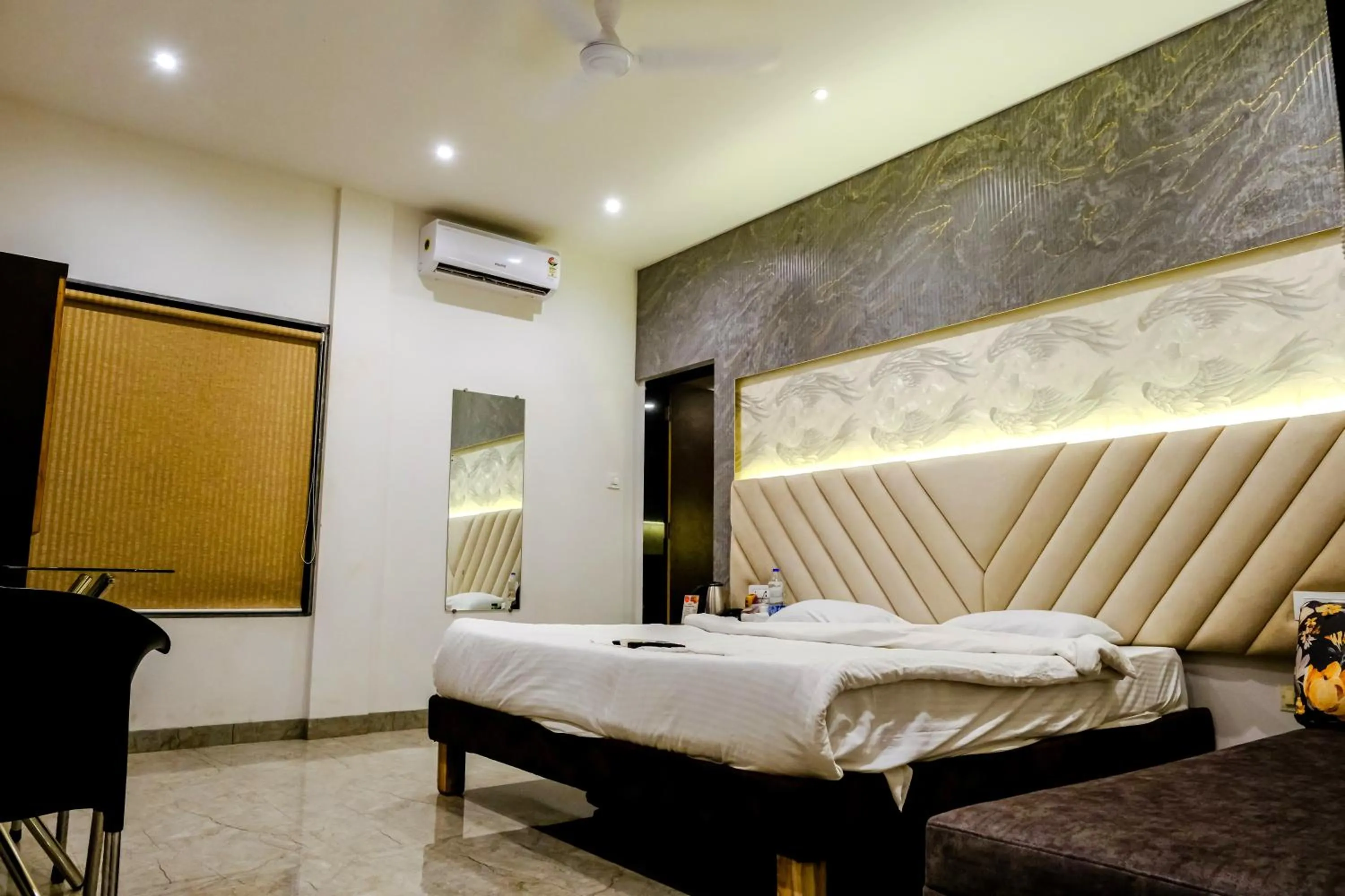 Bed in Sanidhya Beach Resort & Spa