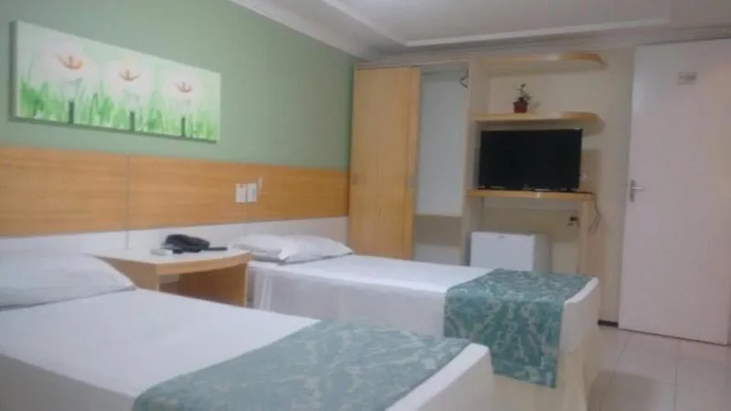 Bed in Raio de Sol Praia Hotel