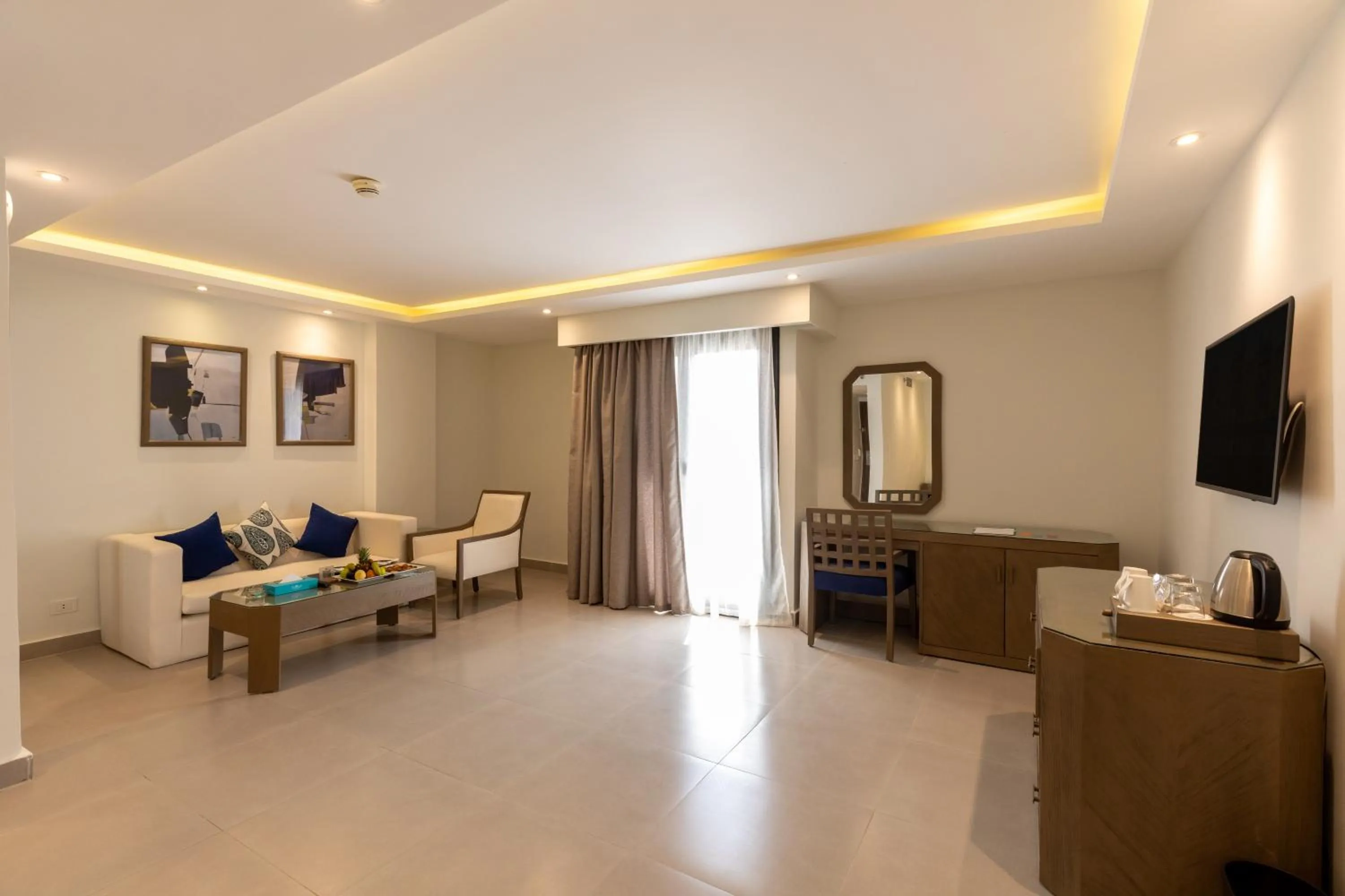 Living room in Sunrise Holidays Resort -Adults Only