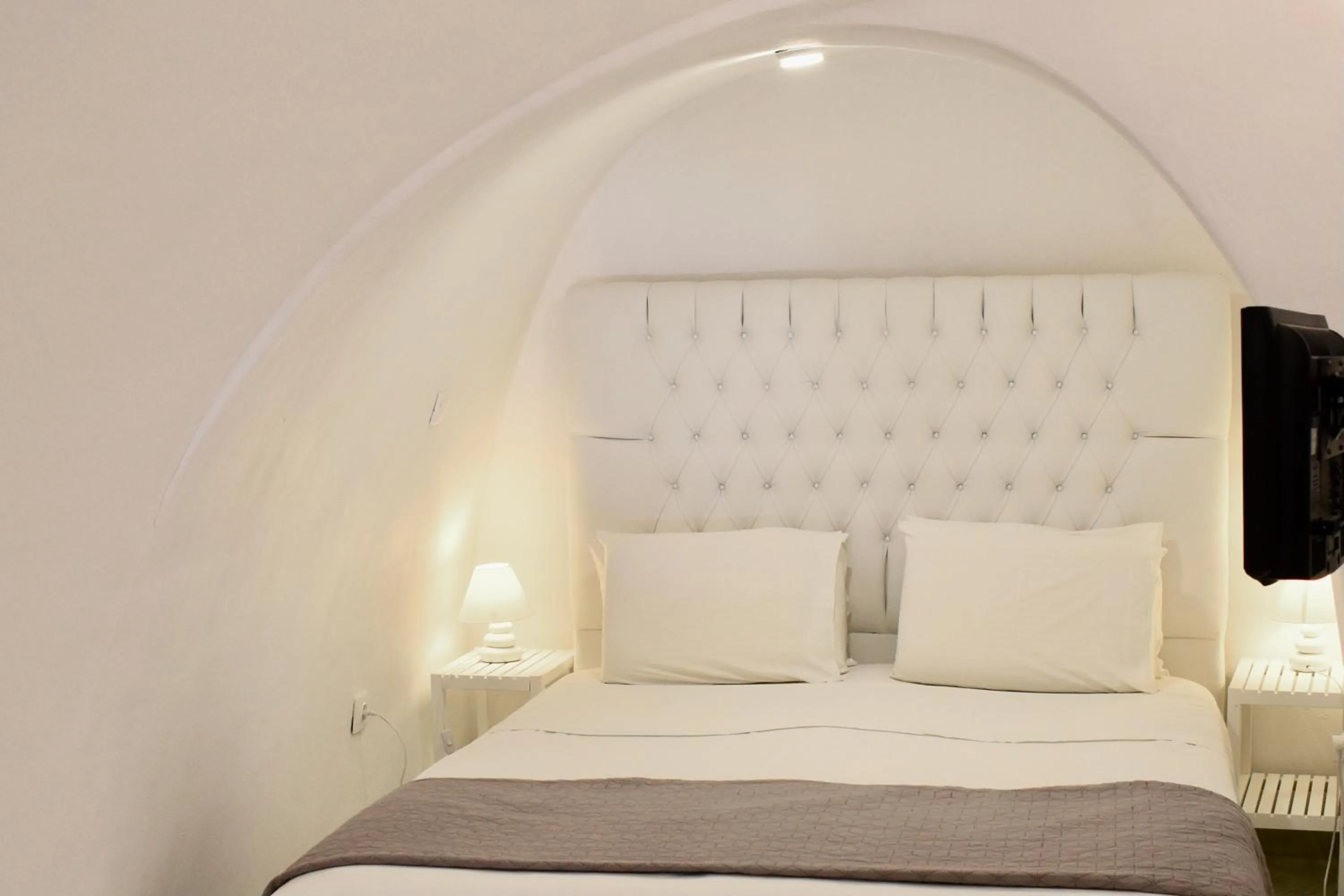 Bed in Aeolos Art & Eco Suites Adults Only