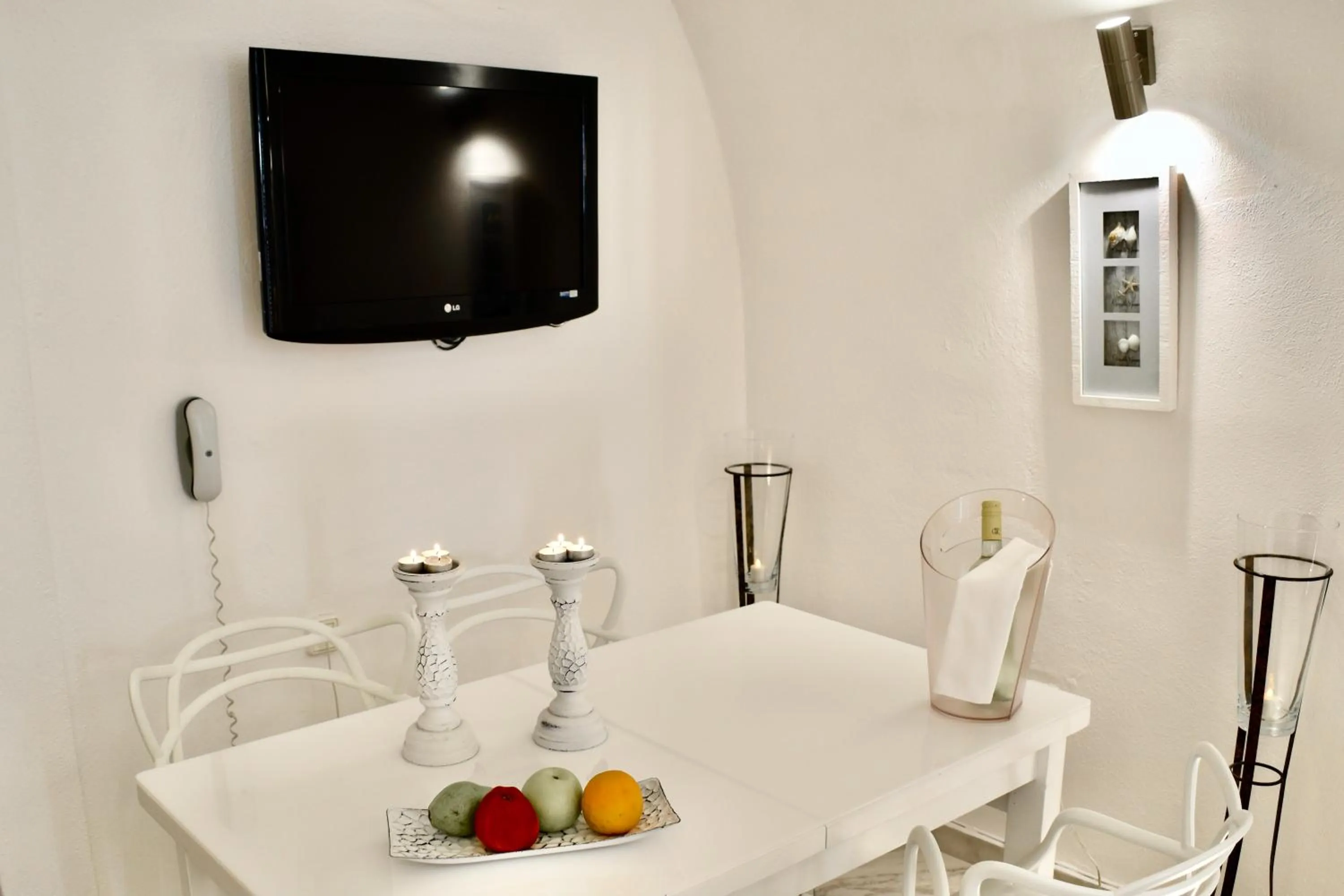 TV and multimedia in Aeolos Art & Eco Suites Adults Only