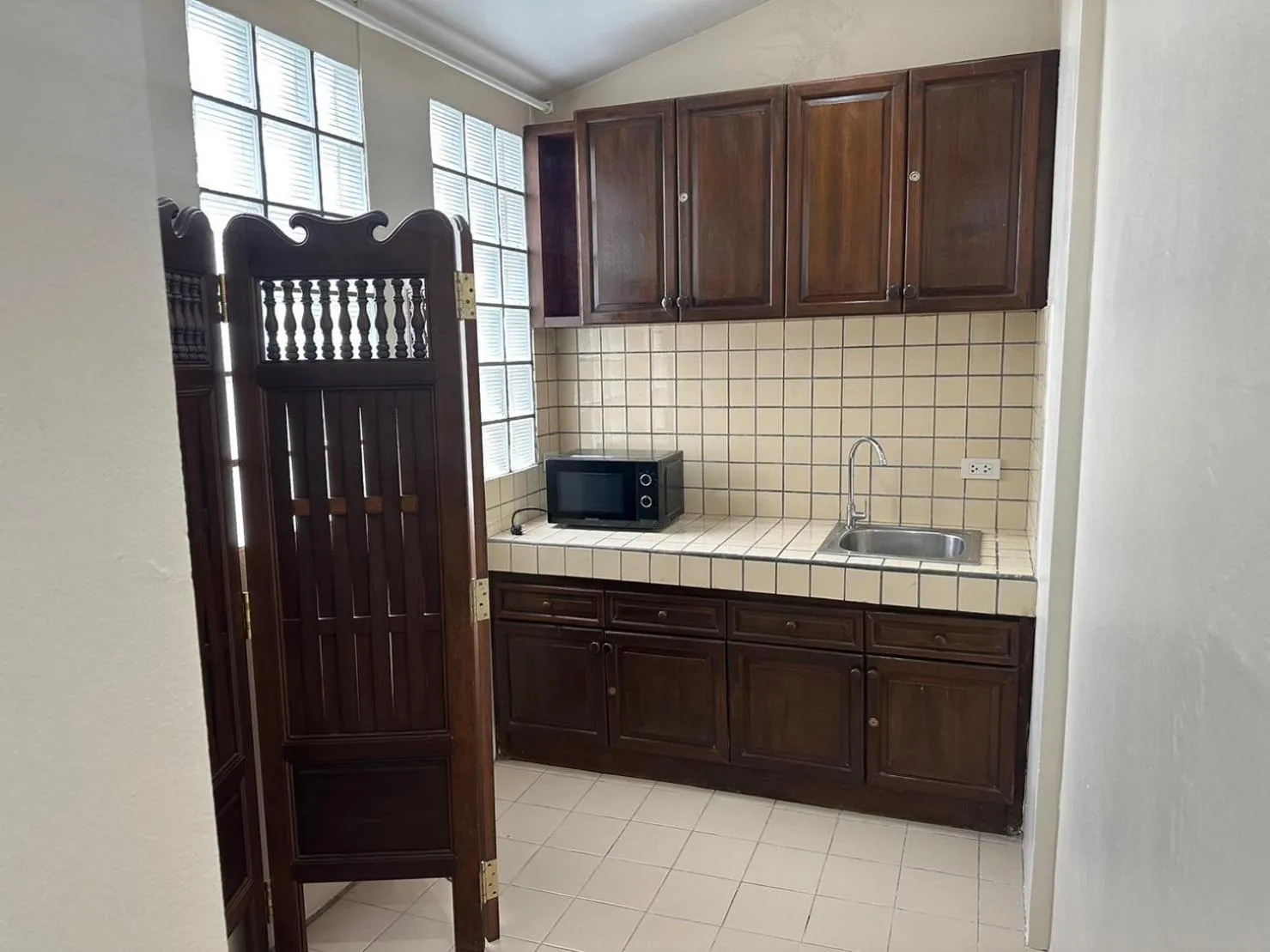 Kitchen or kitchenette in The Siam Heritage Hotel