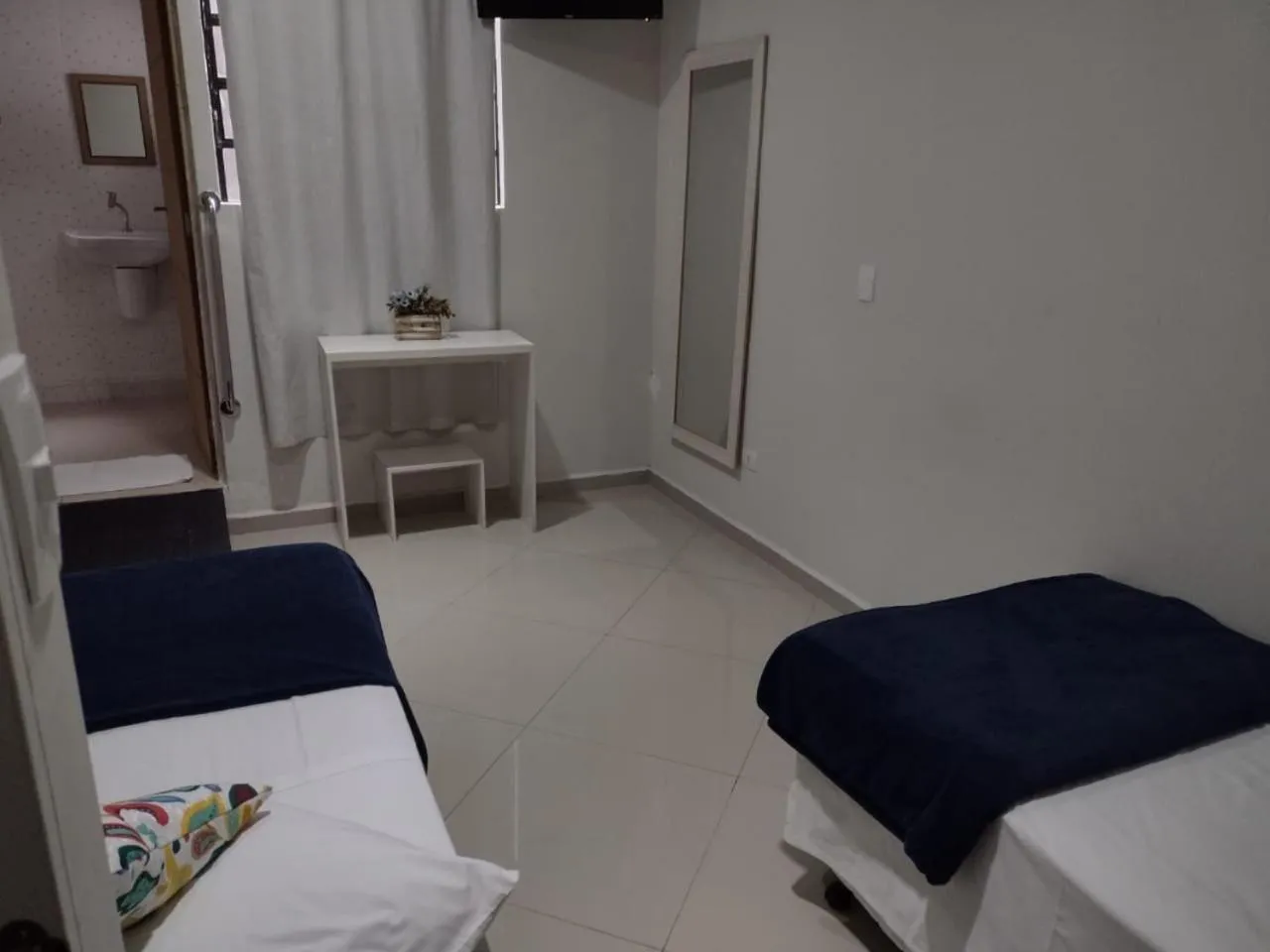 Bed in Pousada TOP Mairiporã