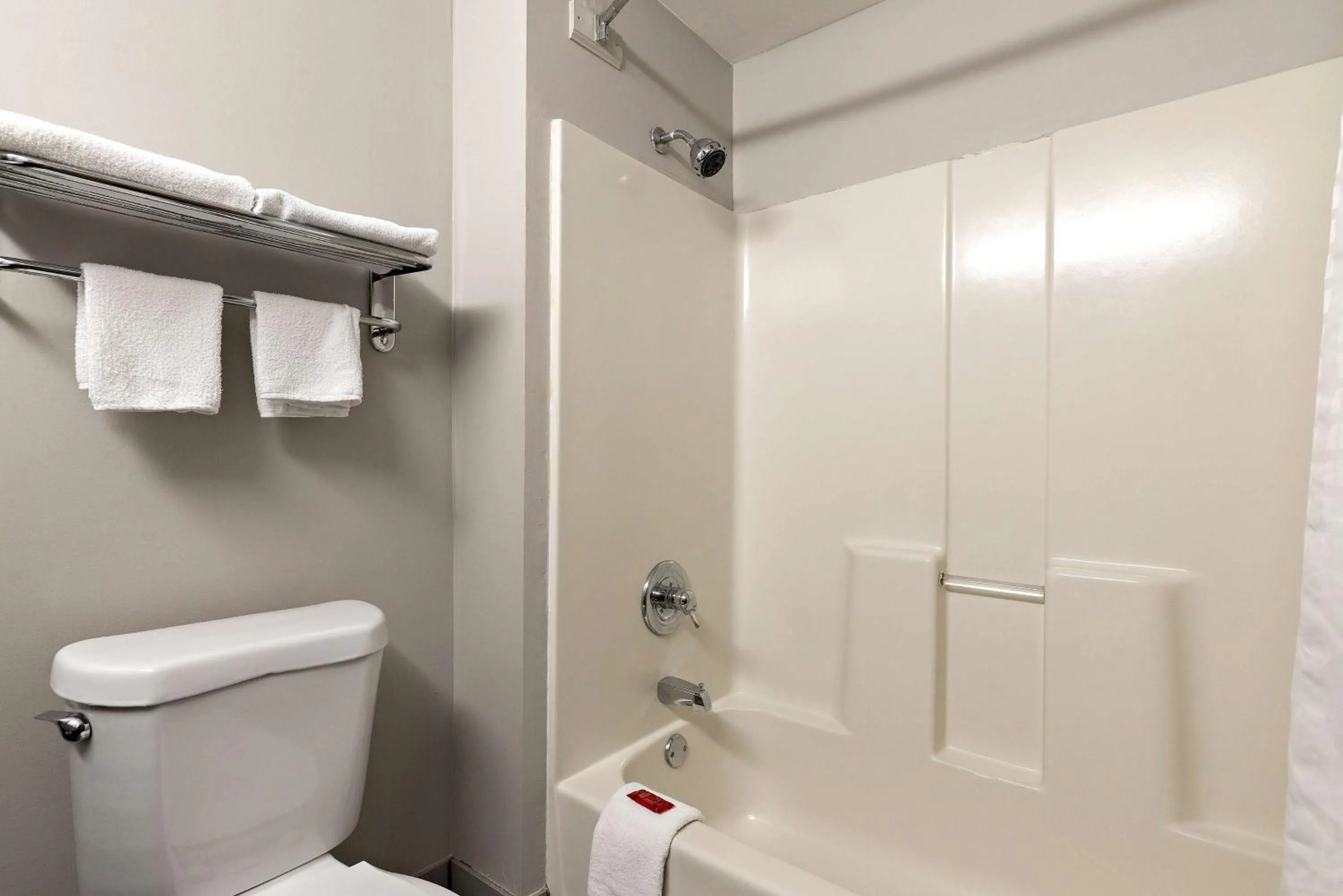Bathroom in SureStay Plus Hotel by Best Western Tulsa East