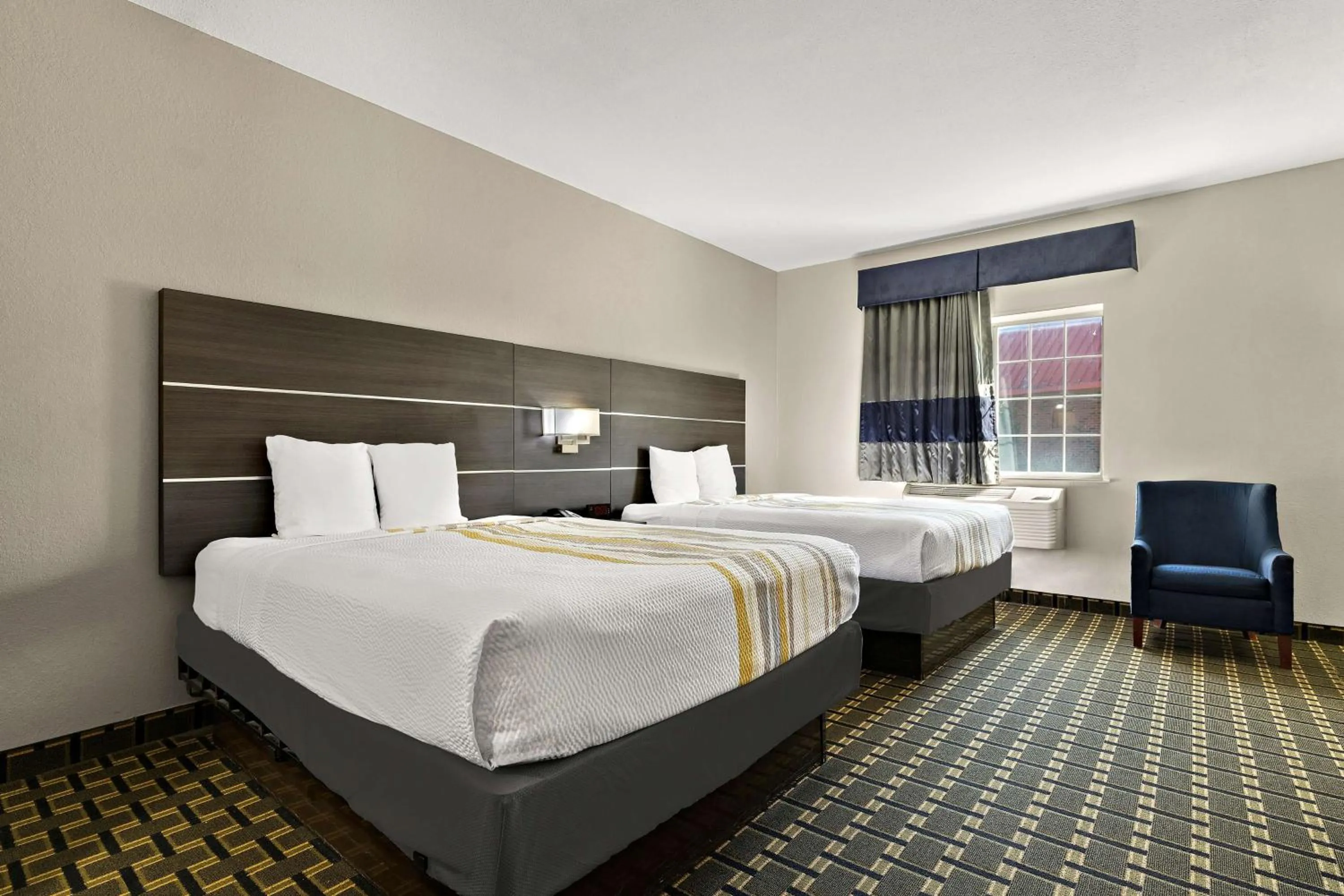 Bedroom, Bed in SureStay Plus Hotel by Best Western Tulsa East