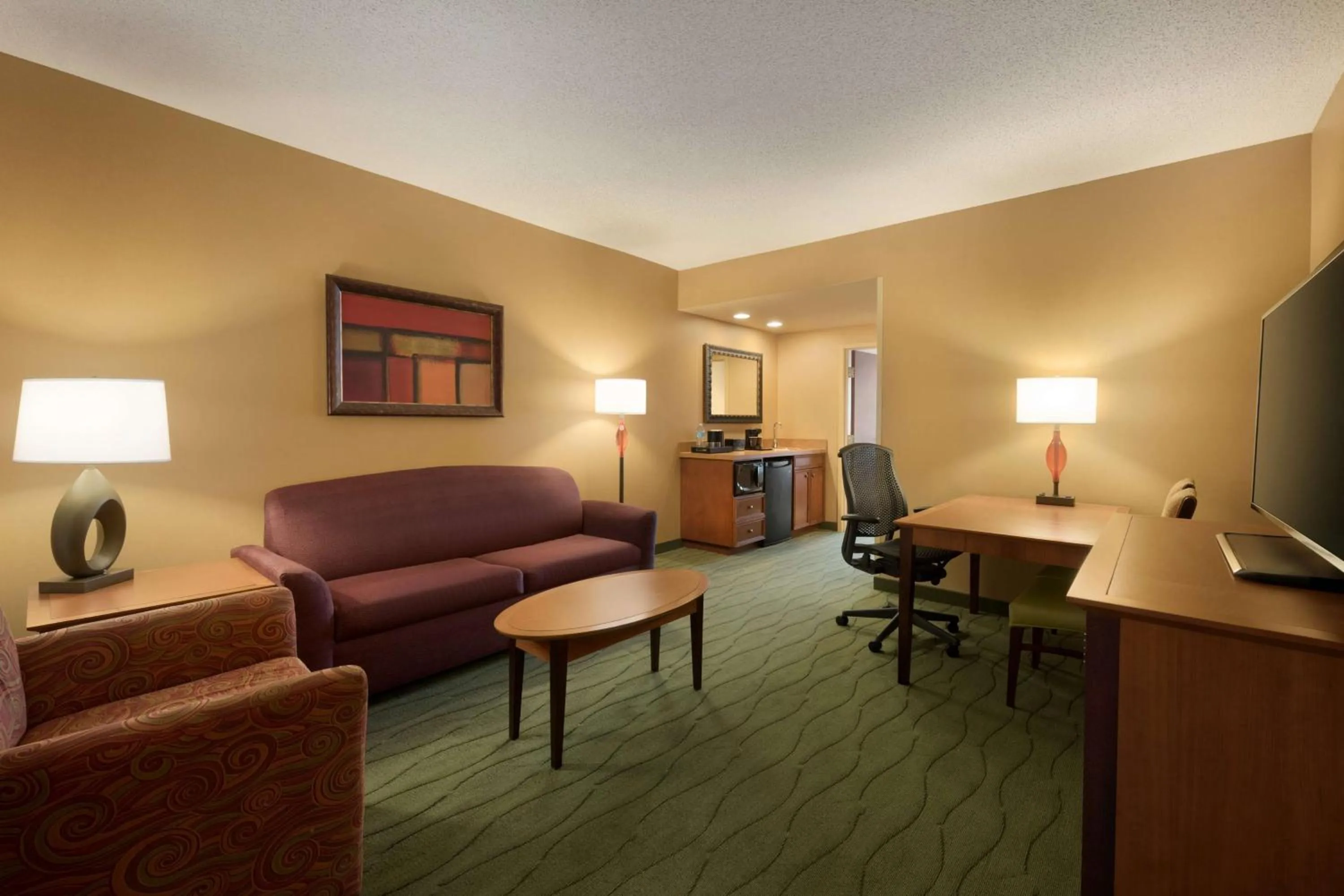 Bedroom in Embassy Suites East Peoria Hotel and Riverfront Conference Center