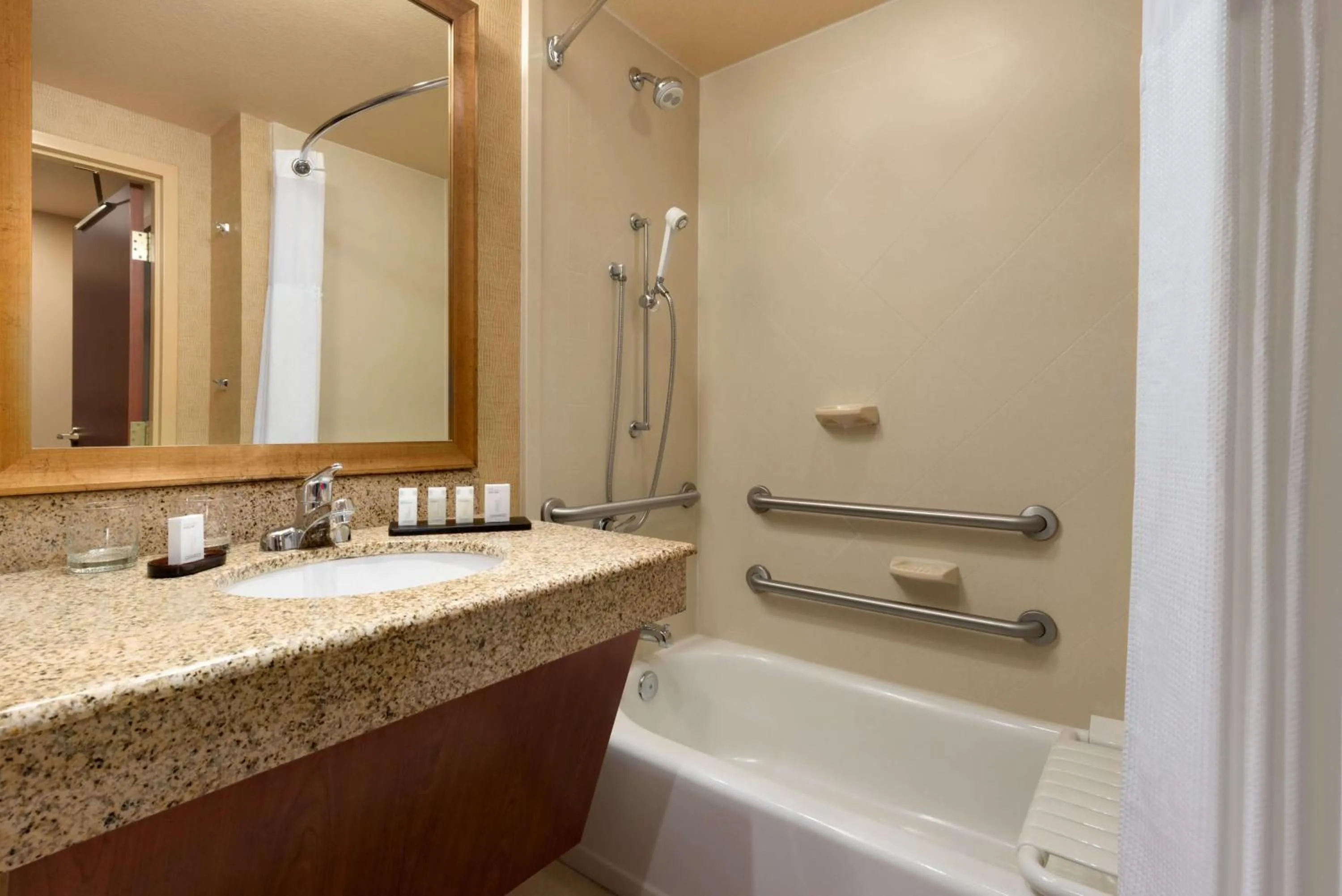 Bathroom in Embassy Suites East Peoria Hotel and Riverfront Conference Center
