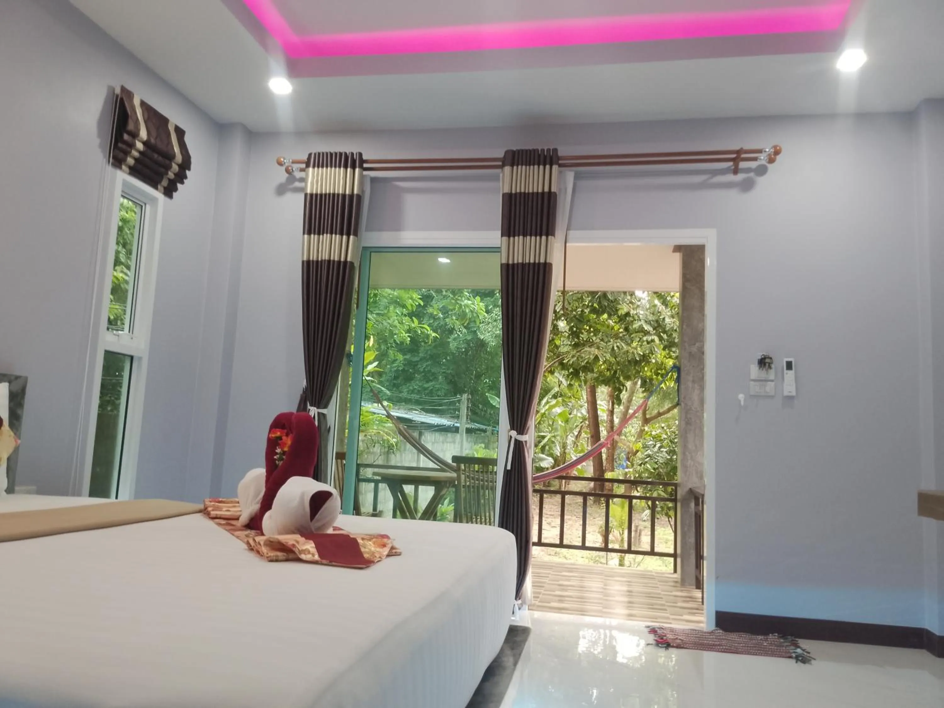 Balcony/Terrace, Bed in Pana Long Beach Resort - SHA Plus