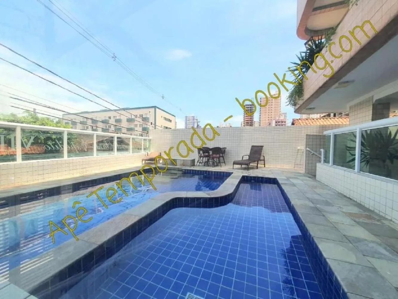 Swimming pool in Apê Temporada Praia Grande SP Completo com Piscina, Churrasqueira, Estacionamento