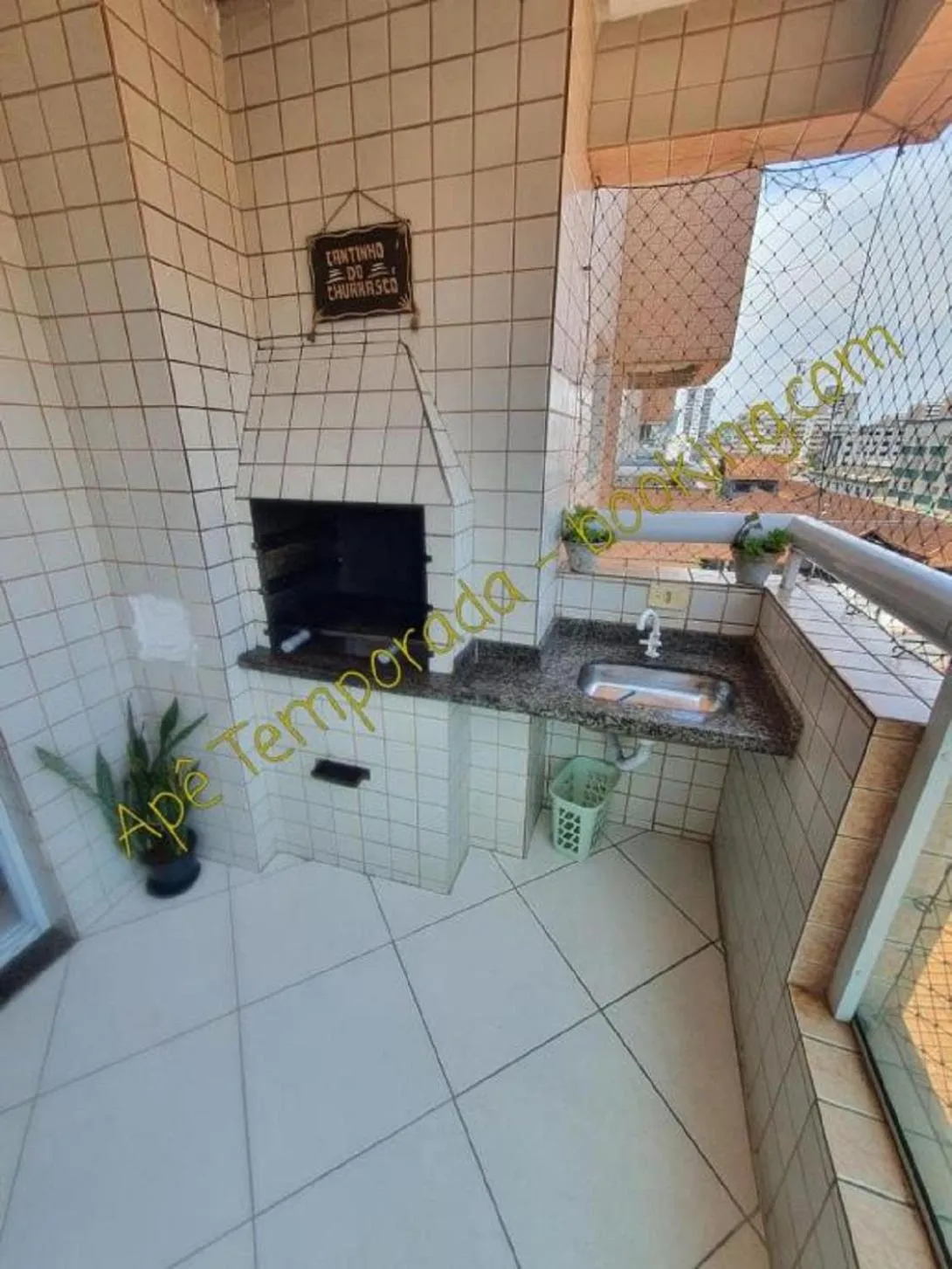 BBQ facilities in Apê Temporada Praia Grande SP Completo com Piscina, Churrasqueira, Estacionamento