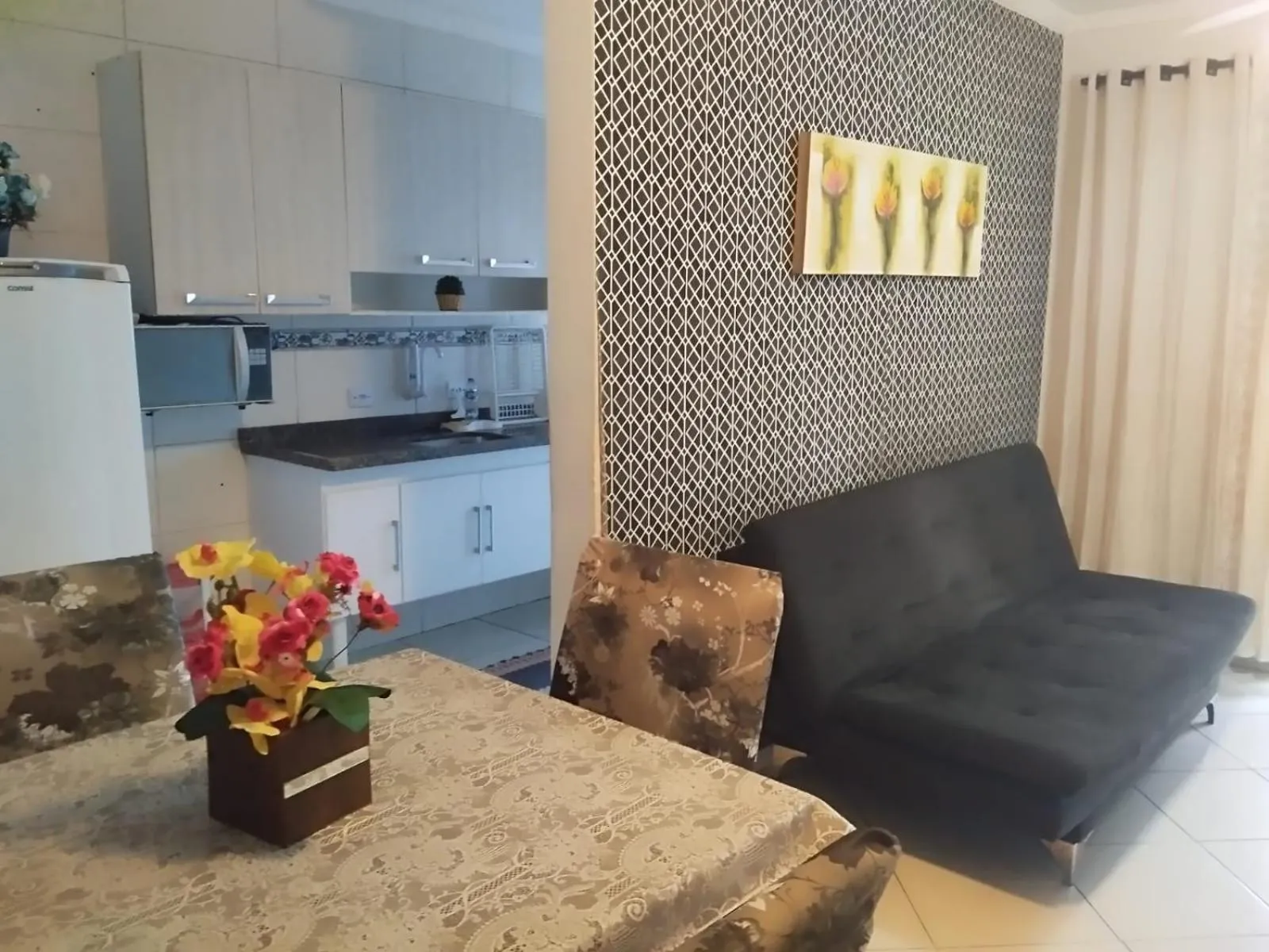 Living room in Apê Temporada Praia Grande SP Completo com Piscina, Churrasqueira, Estacionamento