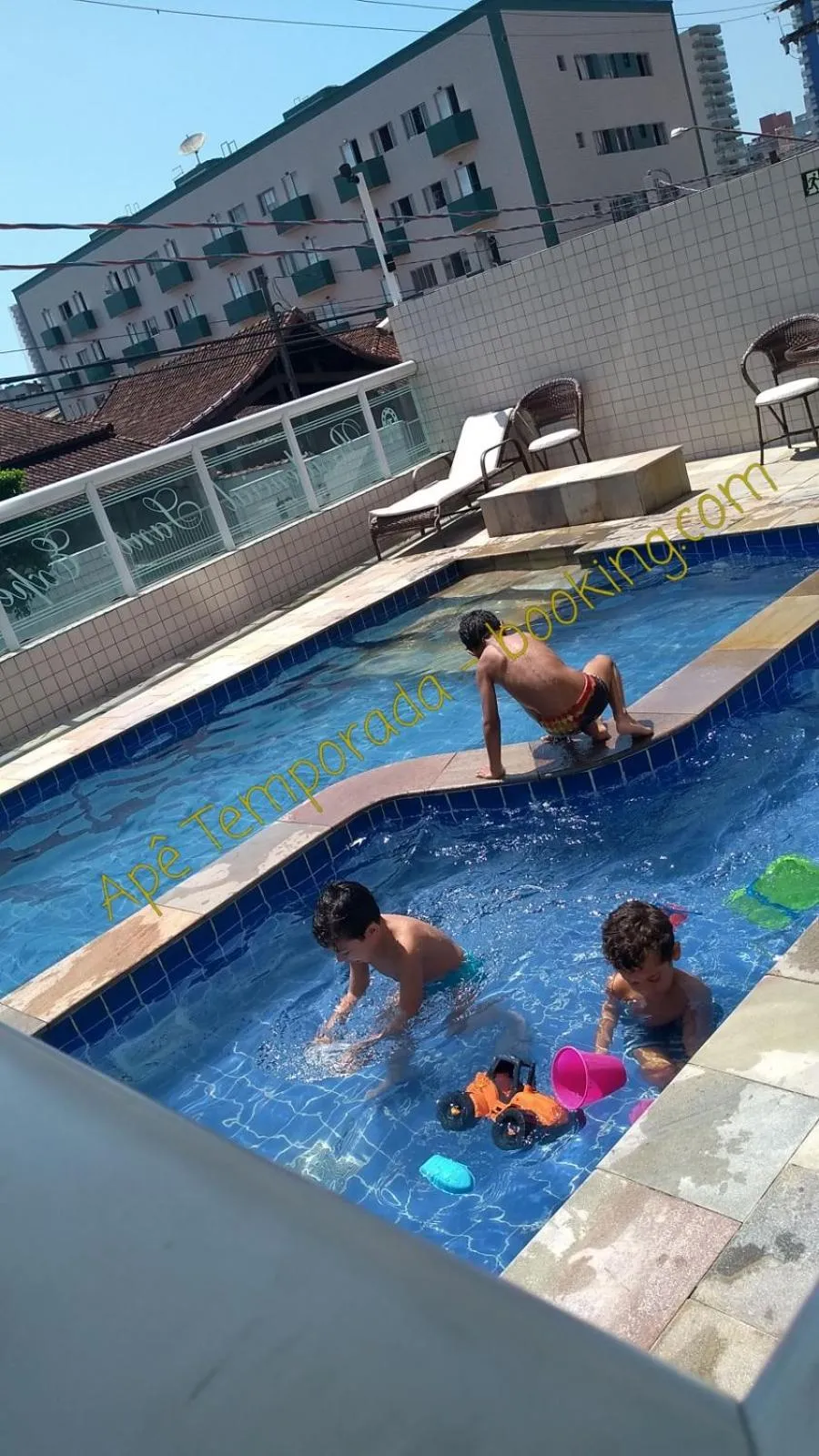 Swimming pool in Apê Temporada Praia Grande SP Completo com Piscina, Churrasqueira, Estacionamento