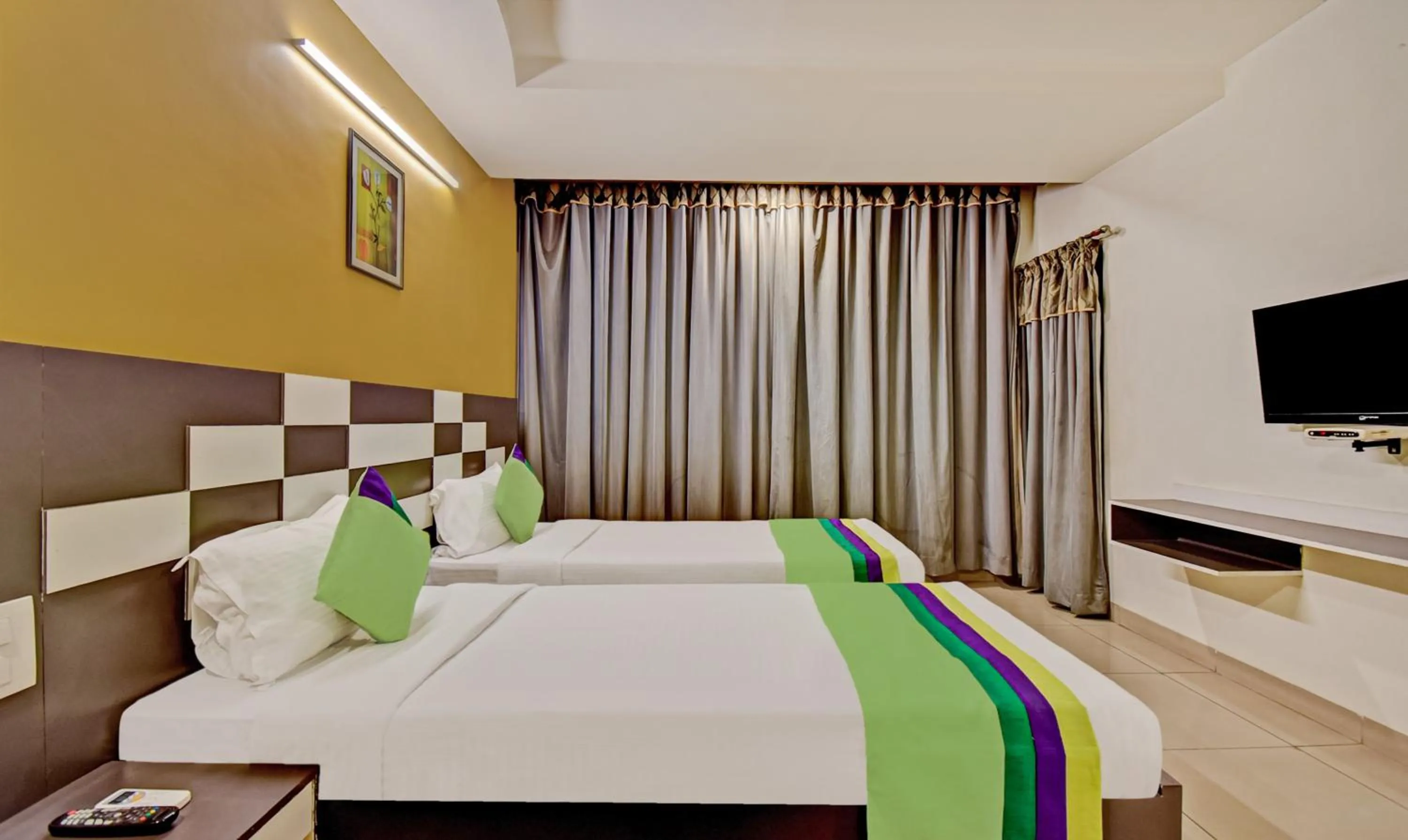 Bedroom, Bed in Treebo Raj Elegance Manyata Tech Park