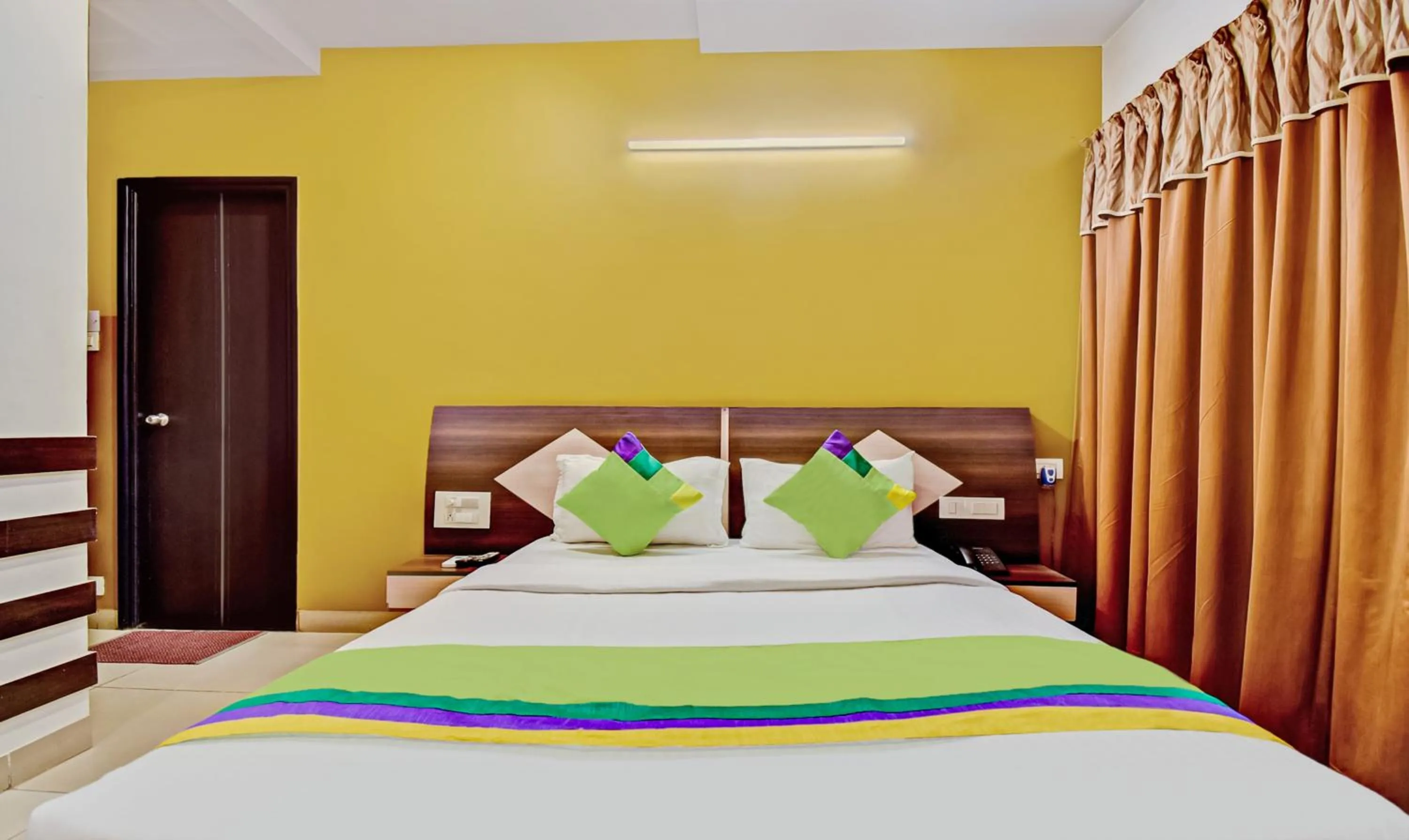 Bedroom, Bed in Treebo Raj Elegance Manyata Tech Park