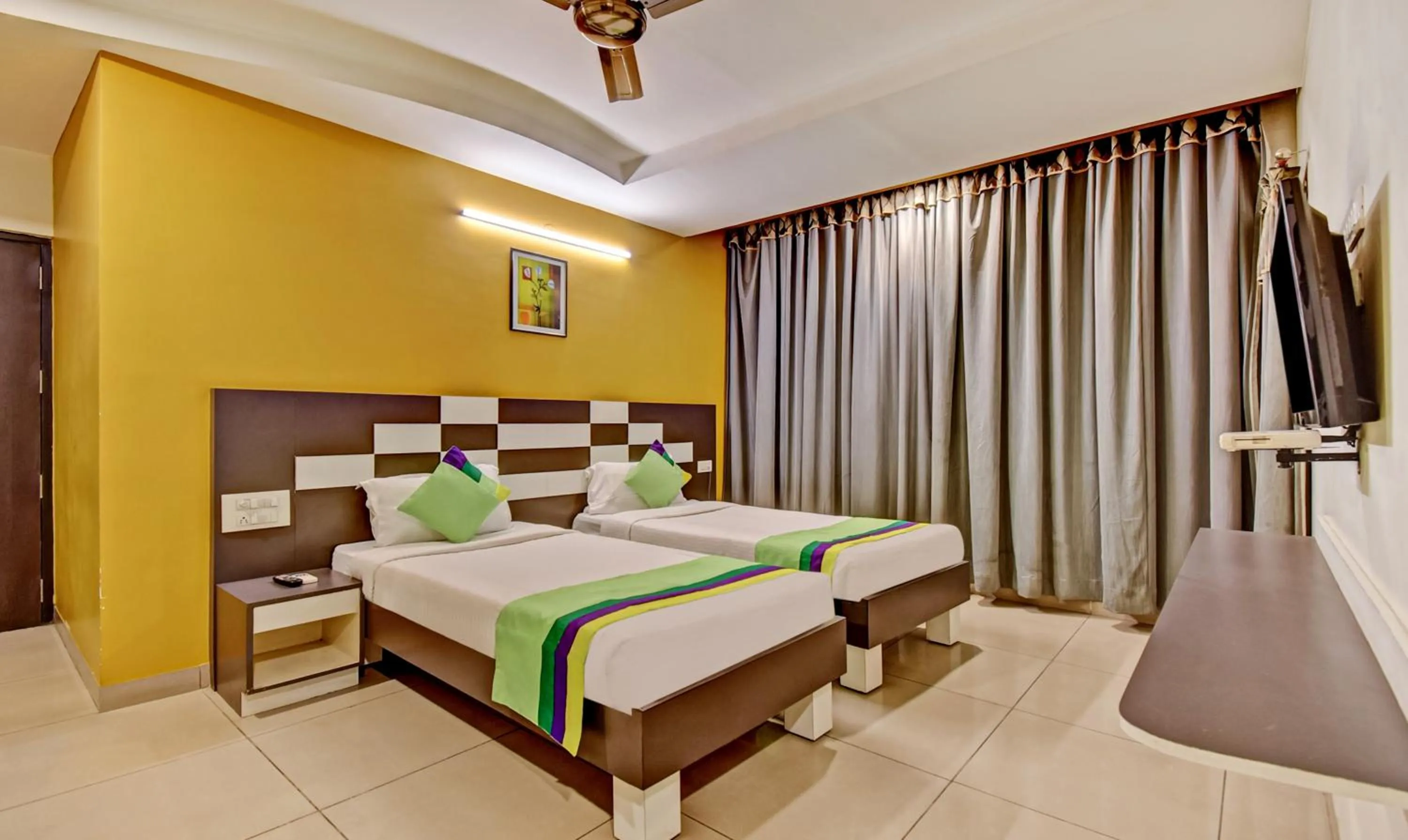 Bedroom, Bed in Treebo Raj Elegance Manyata Tech Park