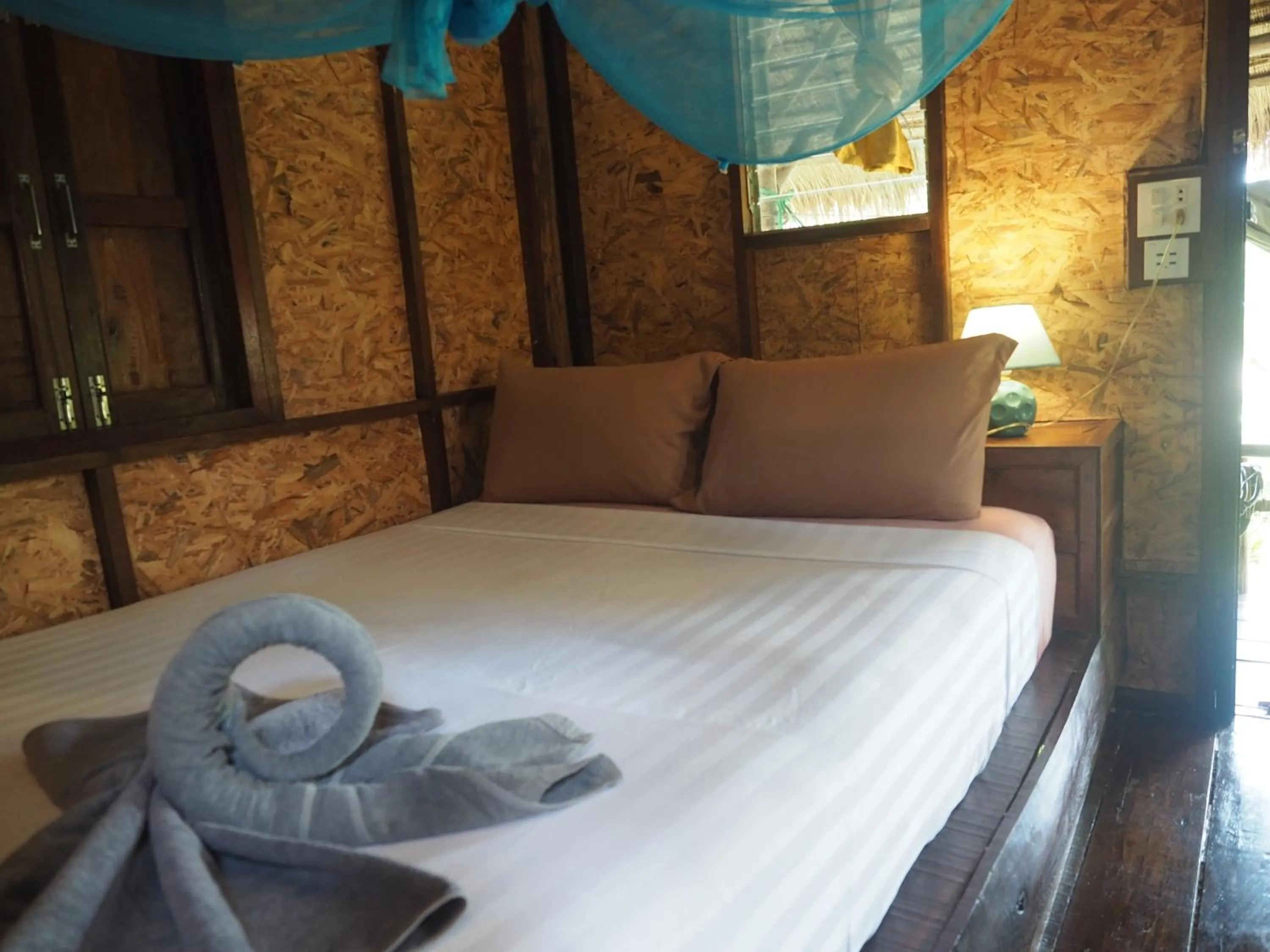 Bed in LITTLE EDEN Bungalows
