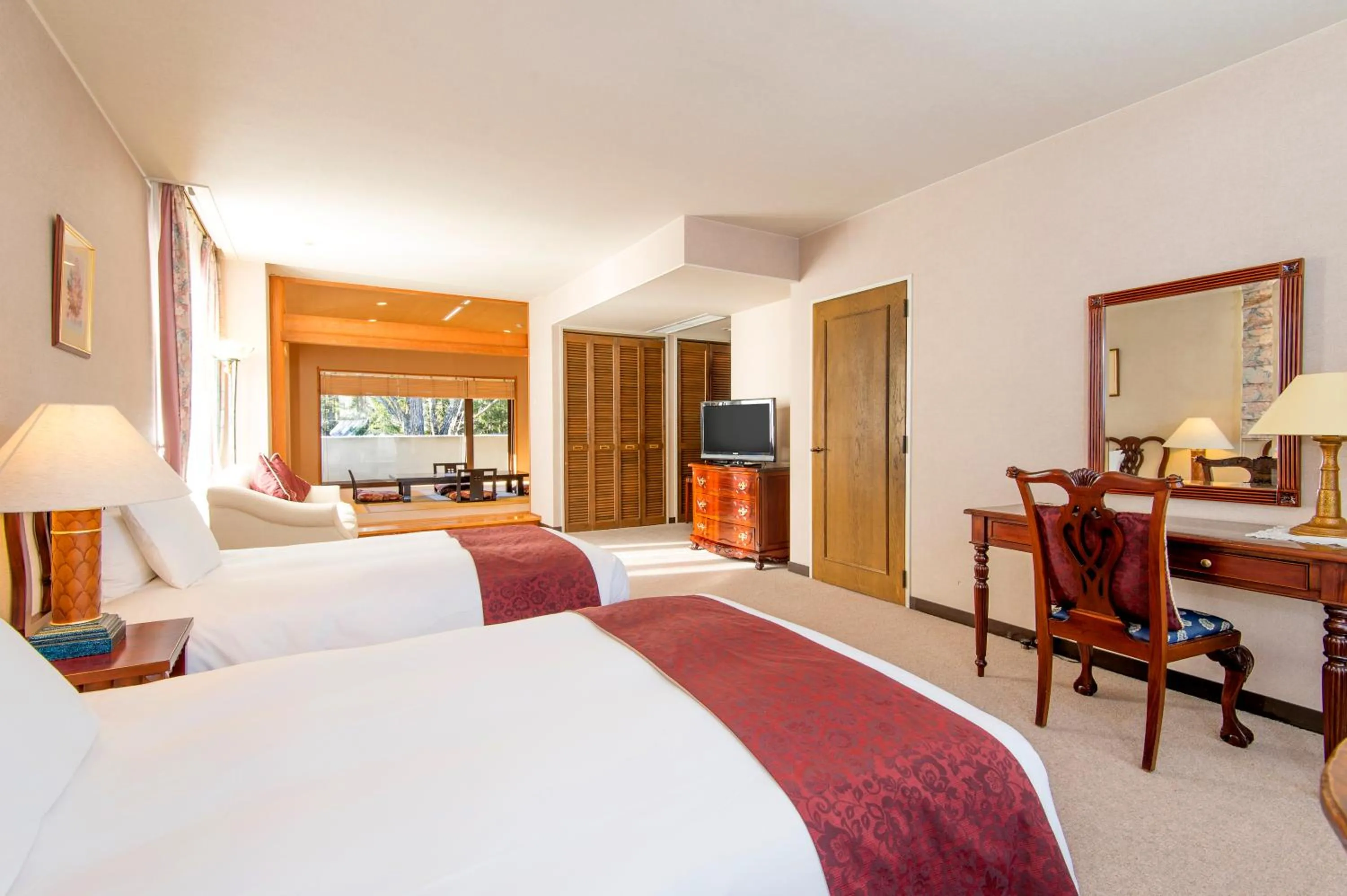 Bed in Hakuba Mominoki Hotel