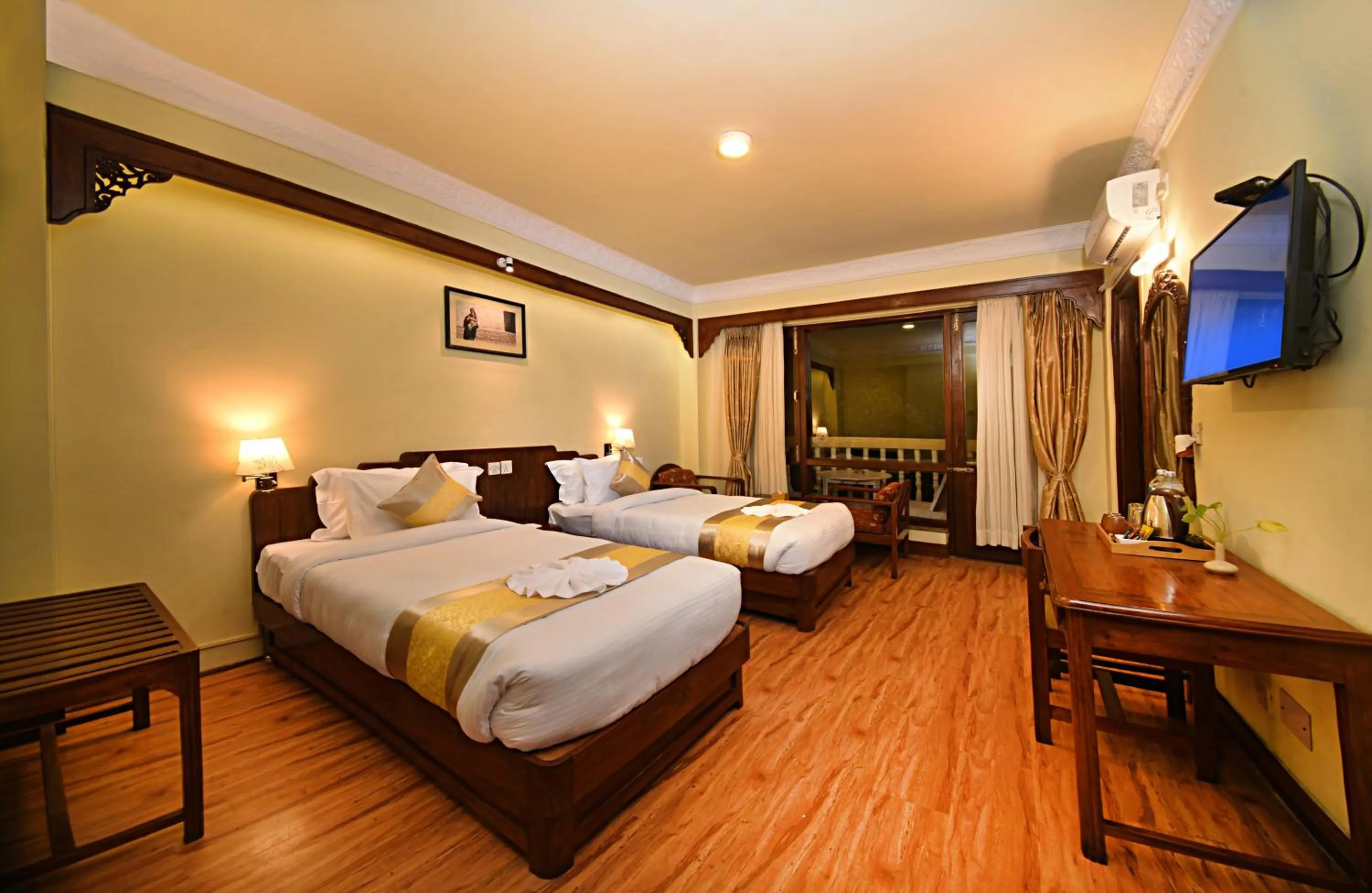 Bed in Nirvana Boutique Hotel