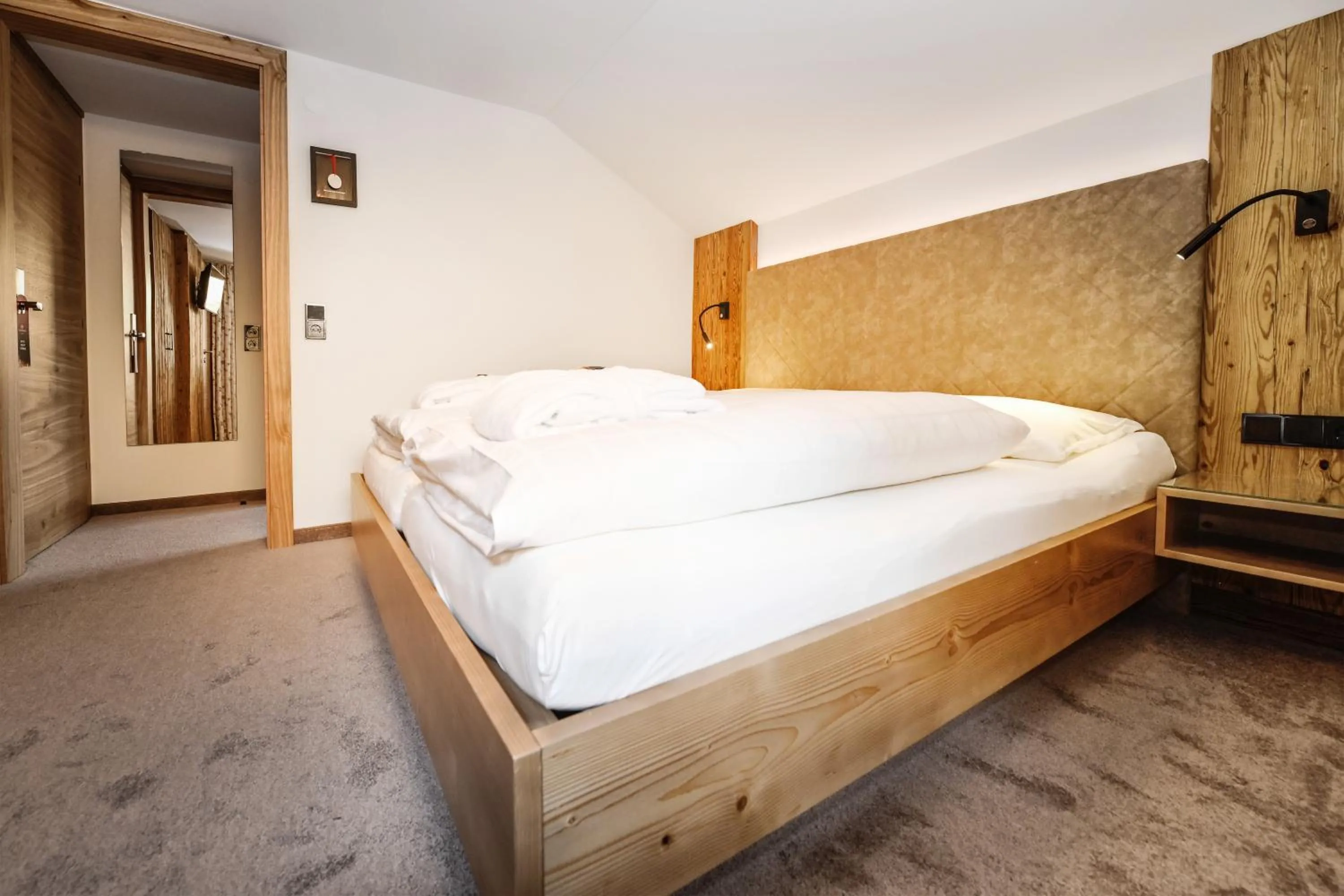 Photo of the whole room, Bed in Hotel Alpenfeuer Montafon