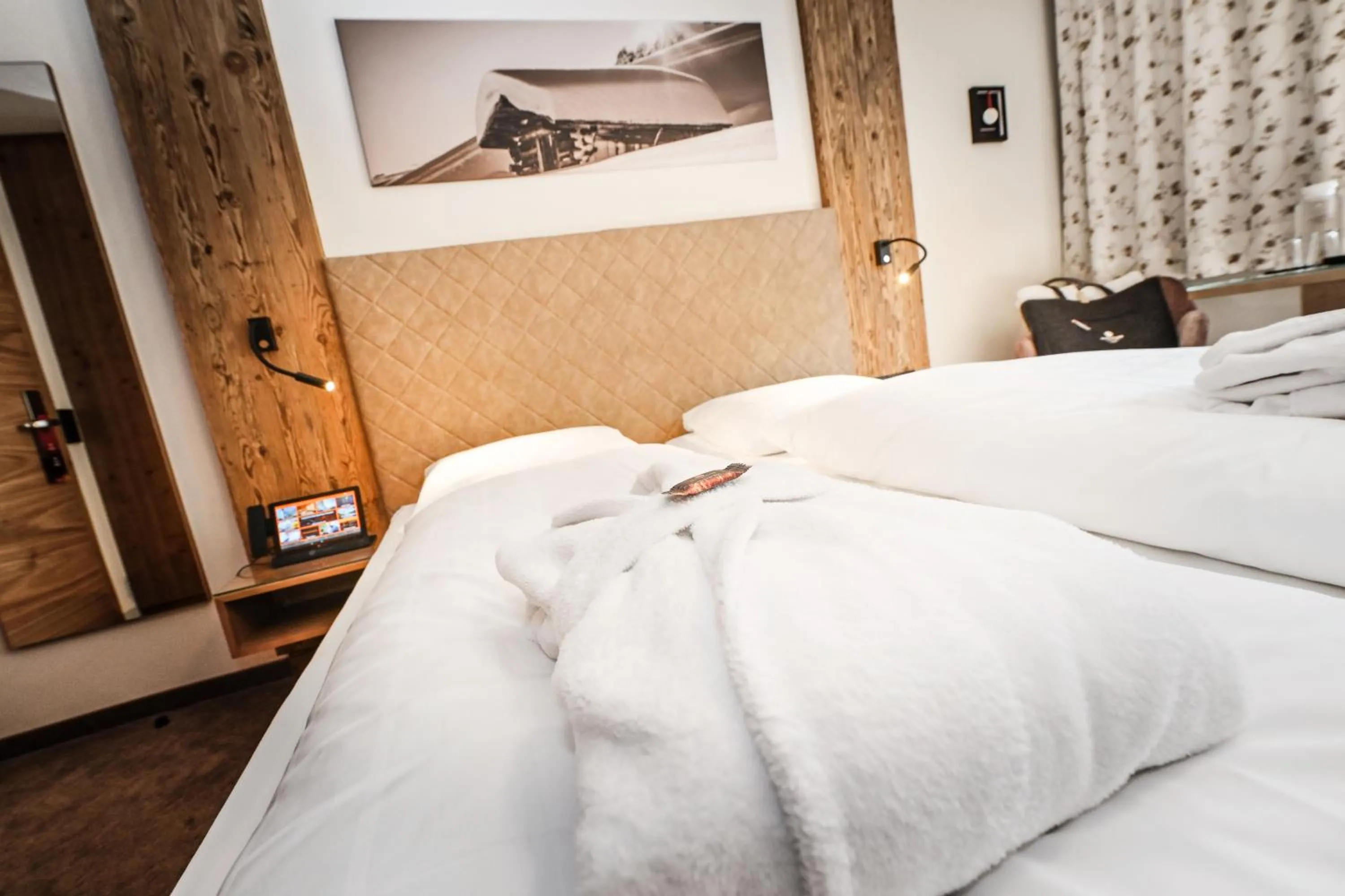 Photo of the whole room, Bed in Hotel Alpenfeuer Montafon