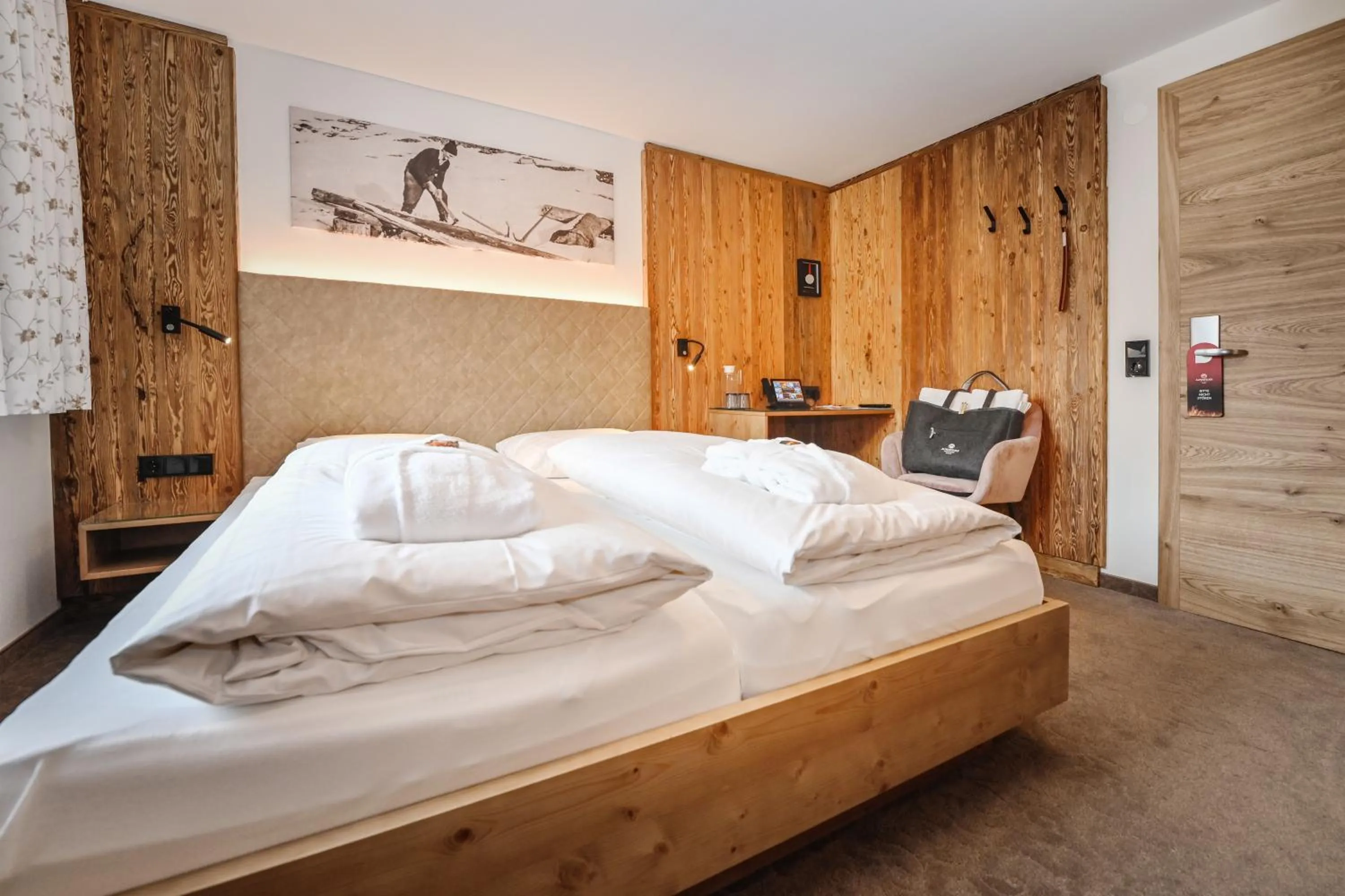 Photo of the whole room, Bed in Hotel Alpenfeuer Montafon