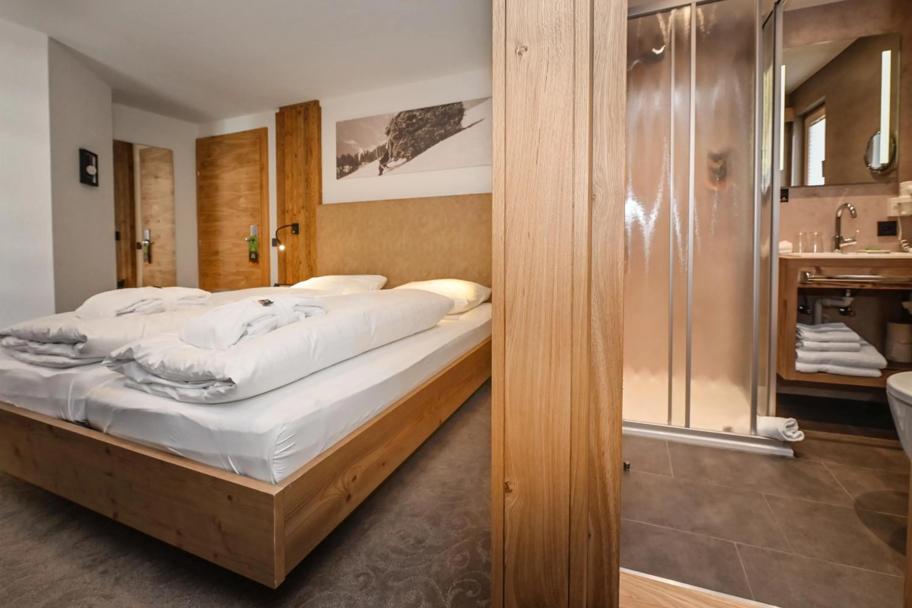 Photo of the whole room, Bed in Hotel Alpenfeuer Montafon