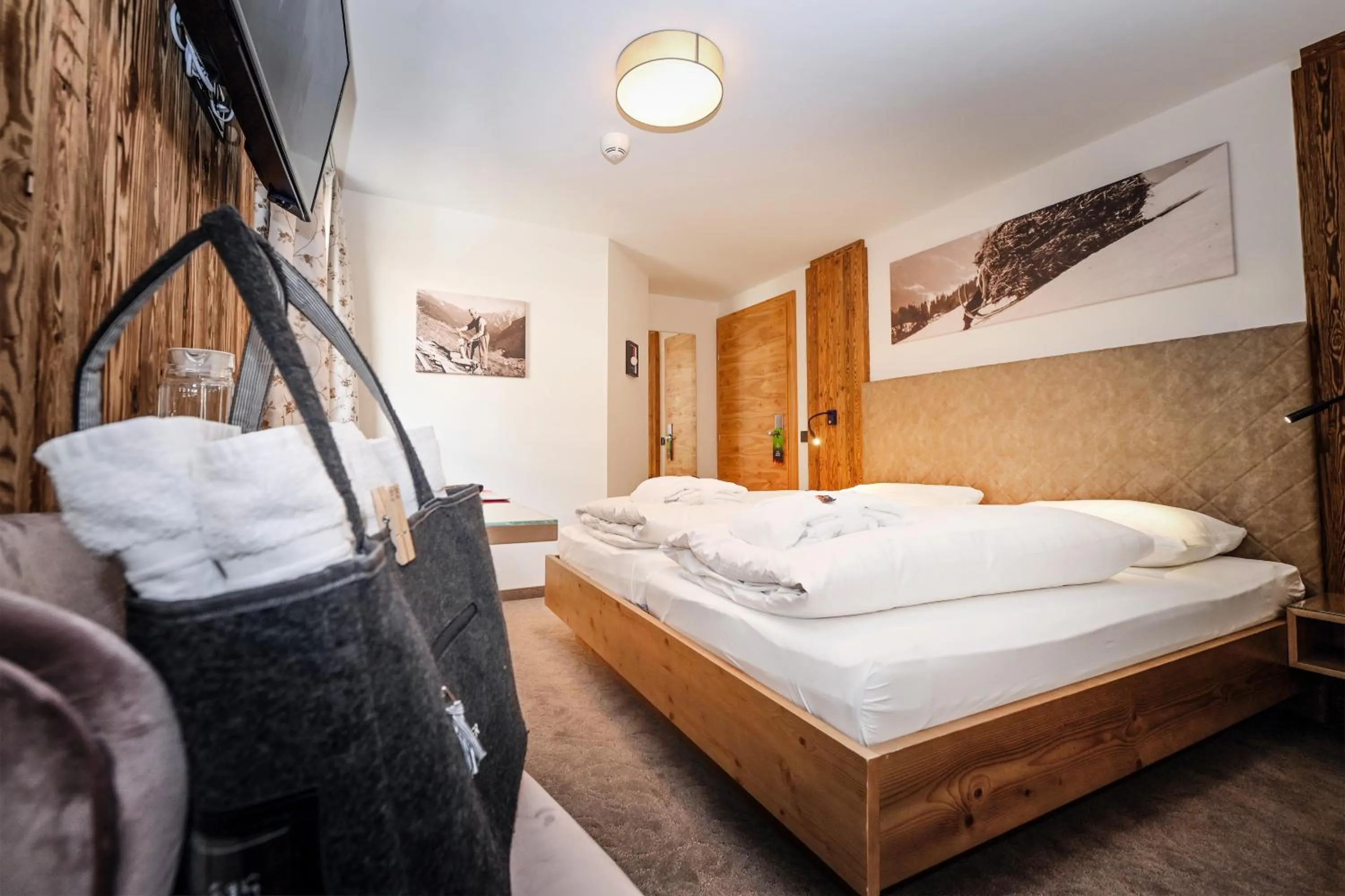 Photo of the whole room, Bed in Hotel Alpenfeuer Montafon