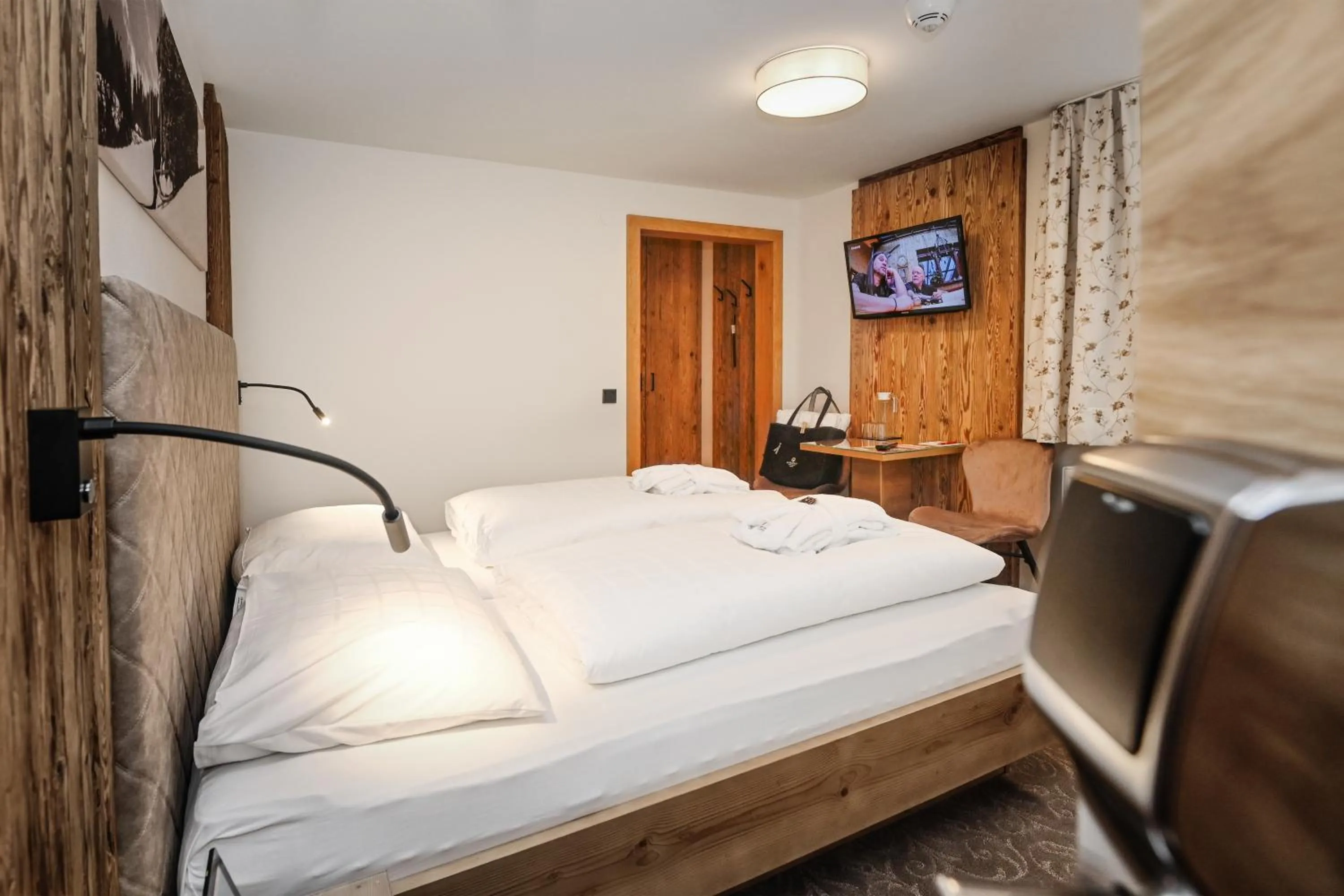 Photo of the whole room, Bed in Hotel Alpenfeuer Montafon