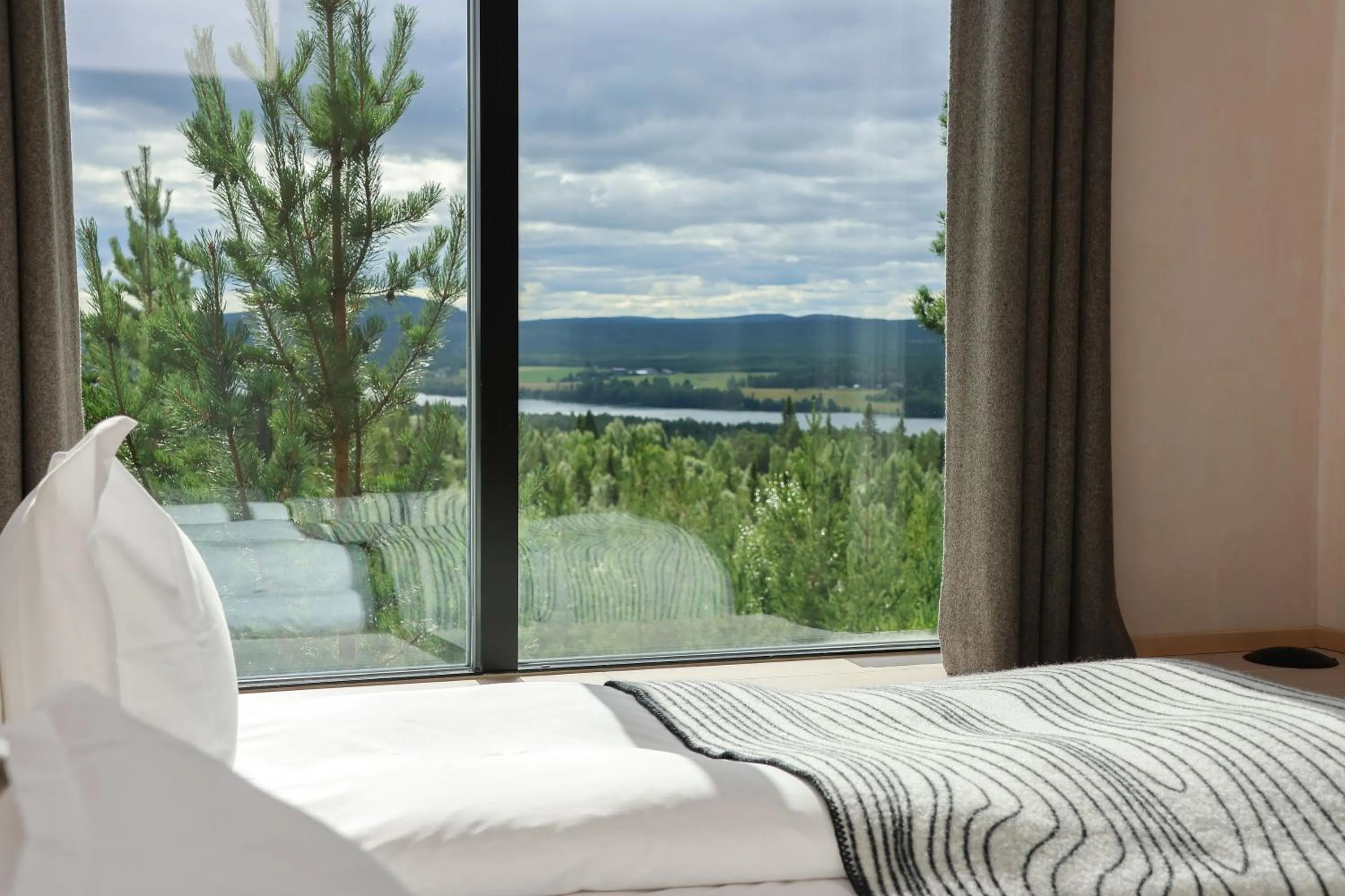 River view, Bed in Treehotel
