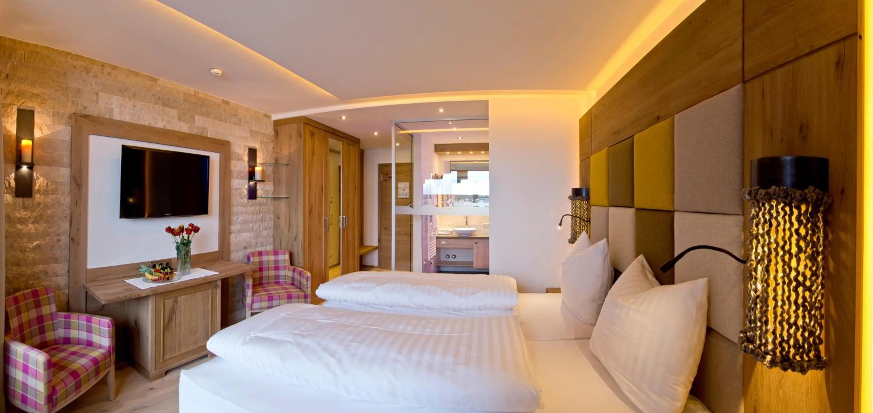 Photo of the whole room, Bed in Sporthotel Ellmau in Tirol