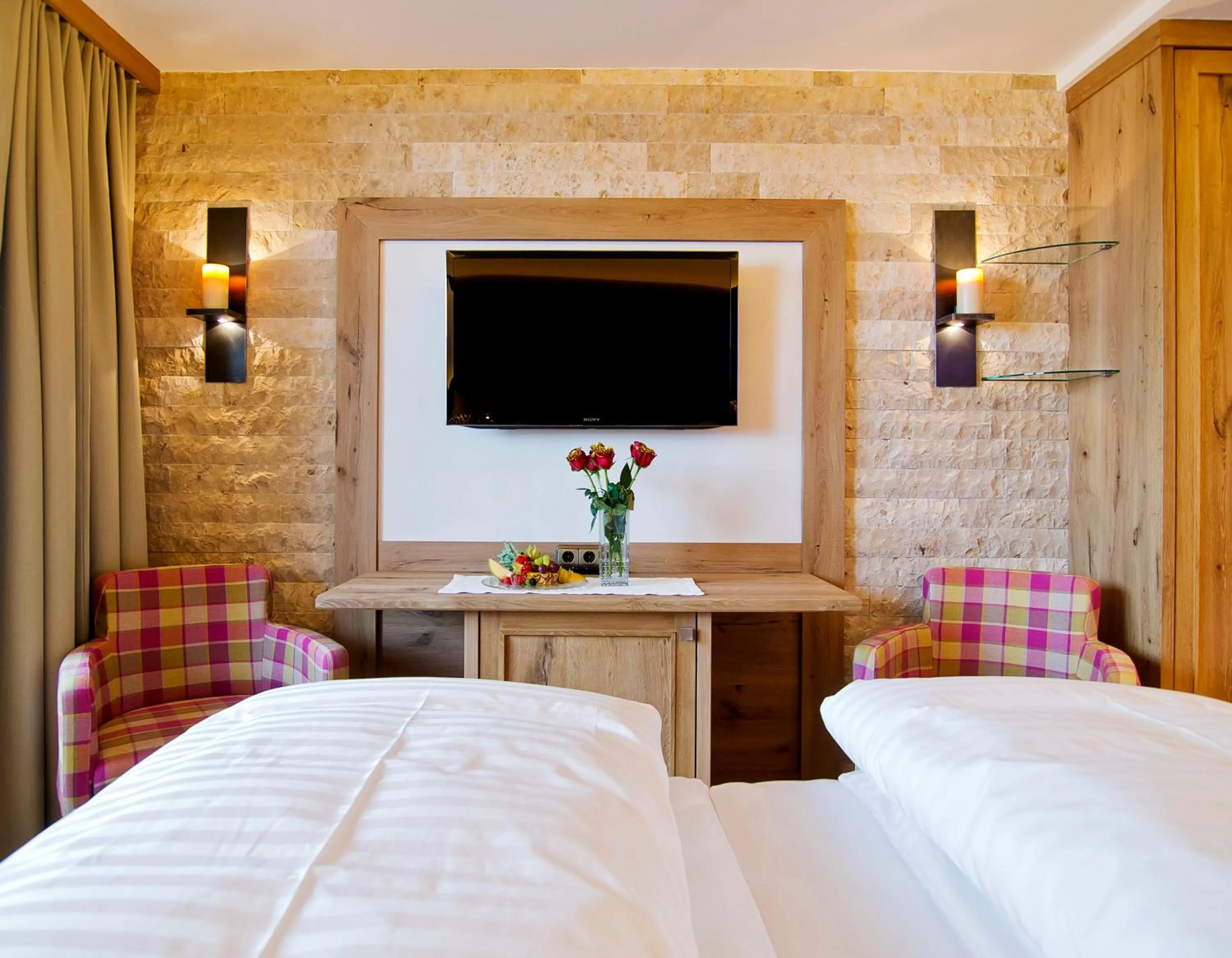 Photo of the whole room, Bed in Sporthotel Ellmau in Tirol