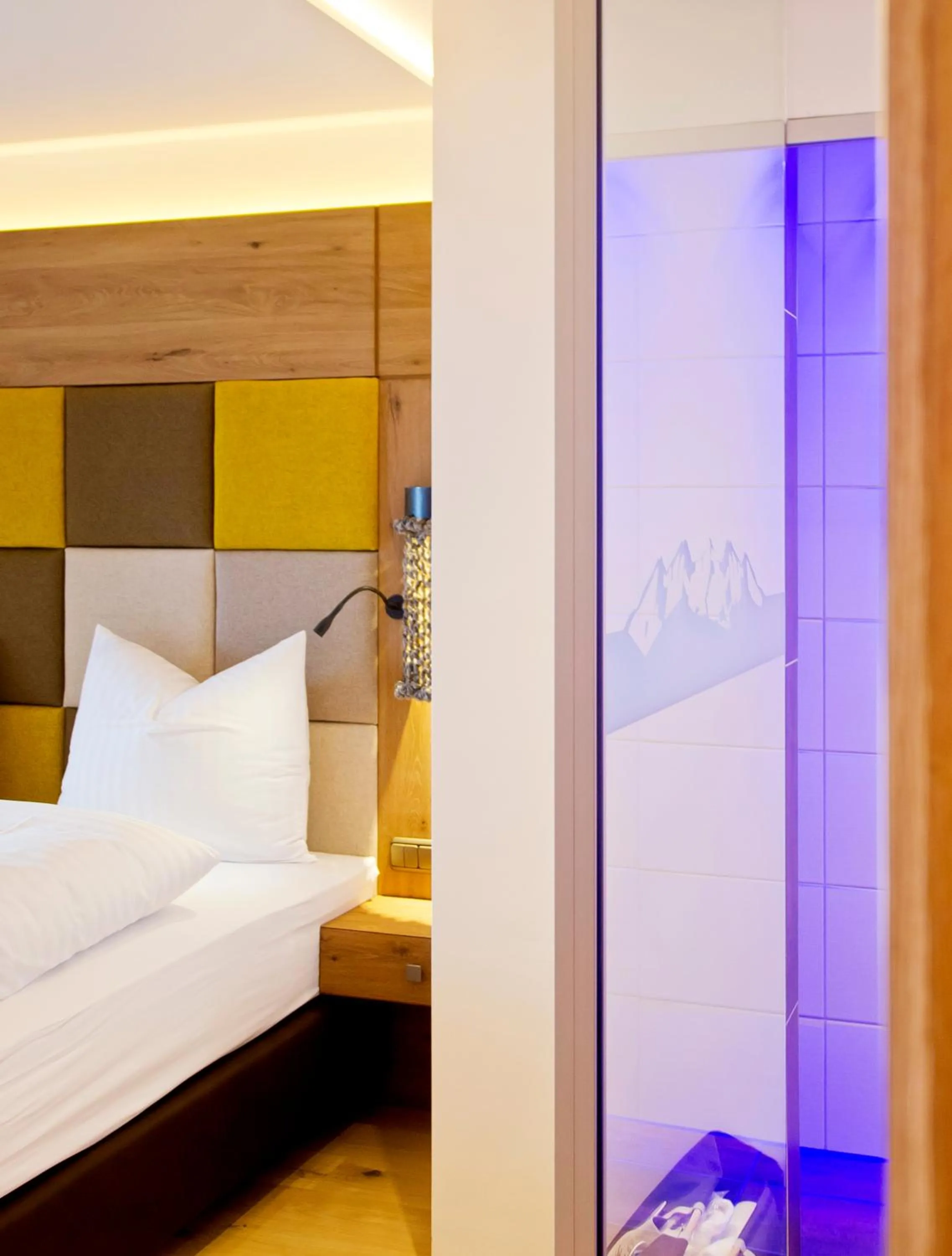 Photo of the whole room, Bed in Sporthotel Ellmau in Tirol