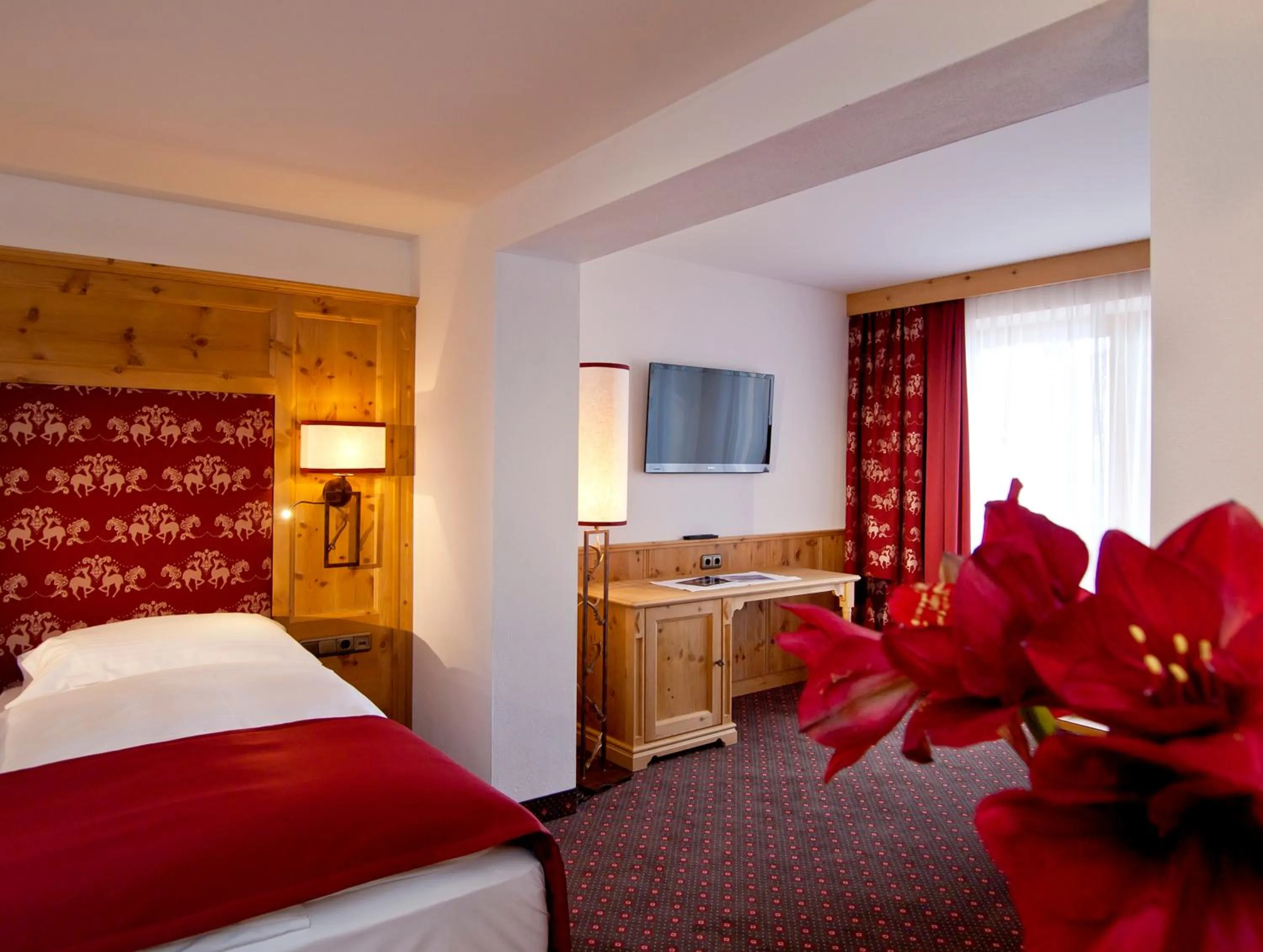 Photo of the whole room, Bed in Sporthotel Ellmau in Tirol