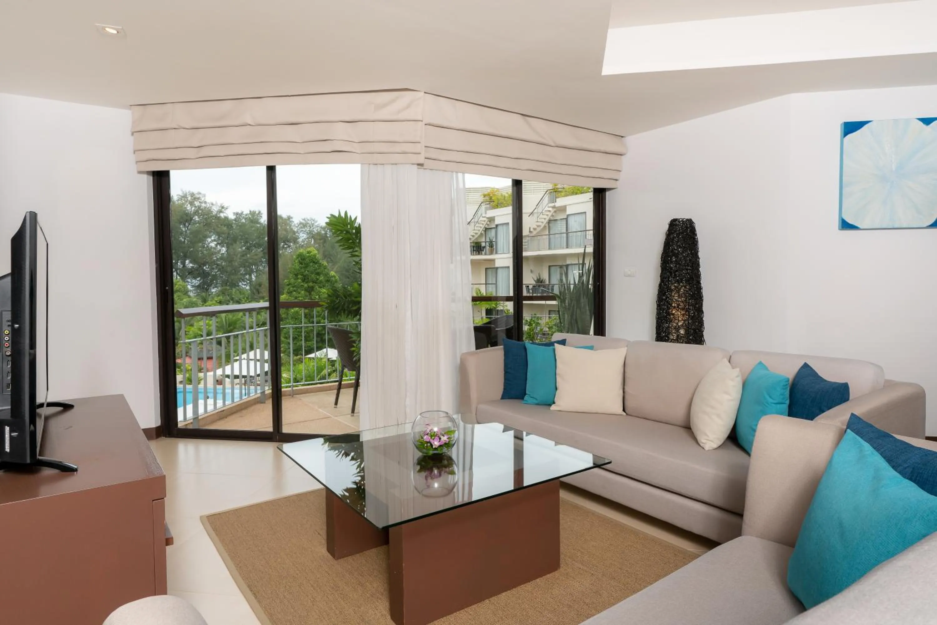 Living room in Dewa Phuket Resort & Villas, Nai Yang Beach