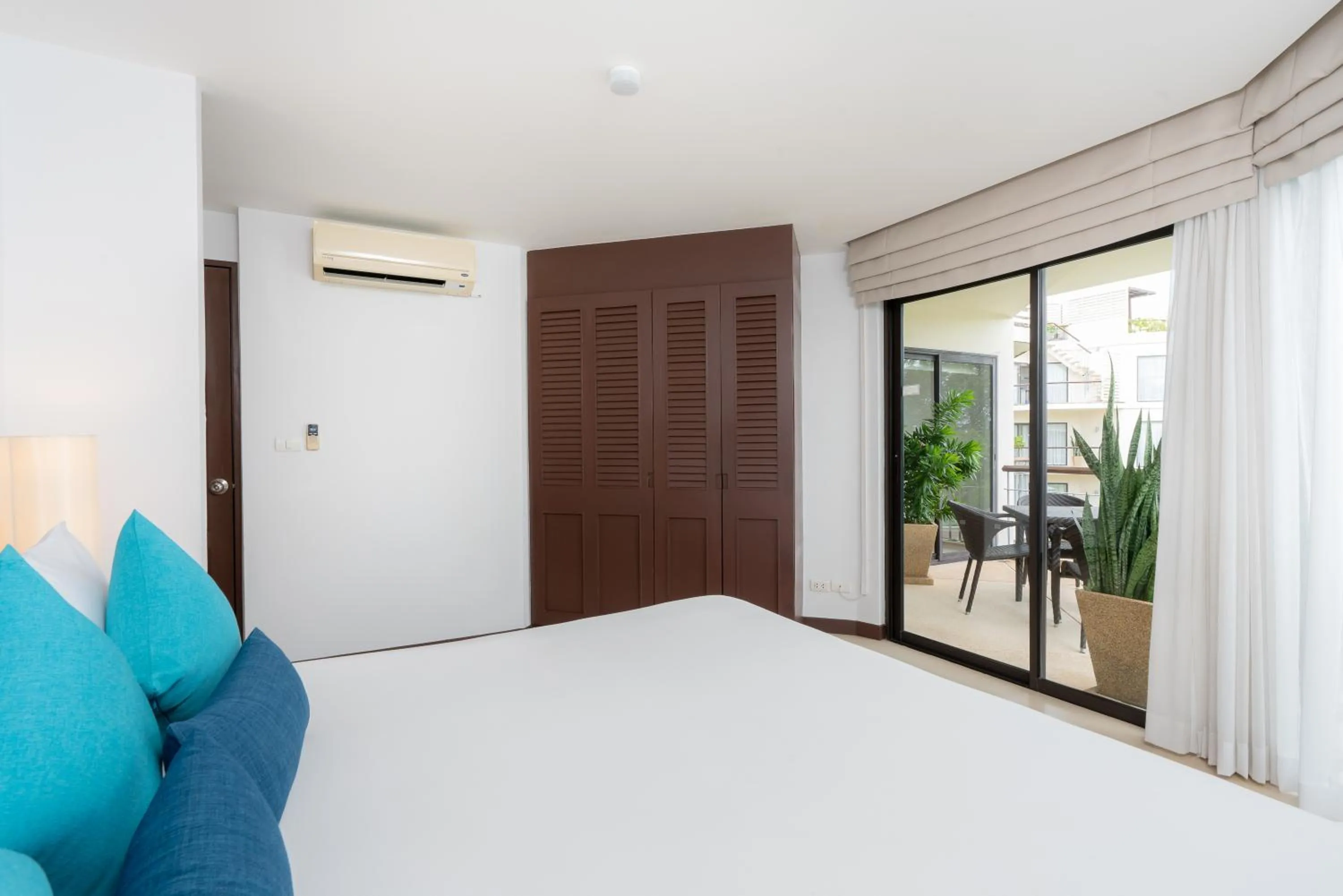 Bedroom, Bed in Dewa Phuket Resort & Villas, Nai Yang Beach