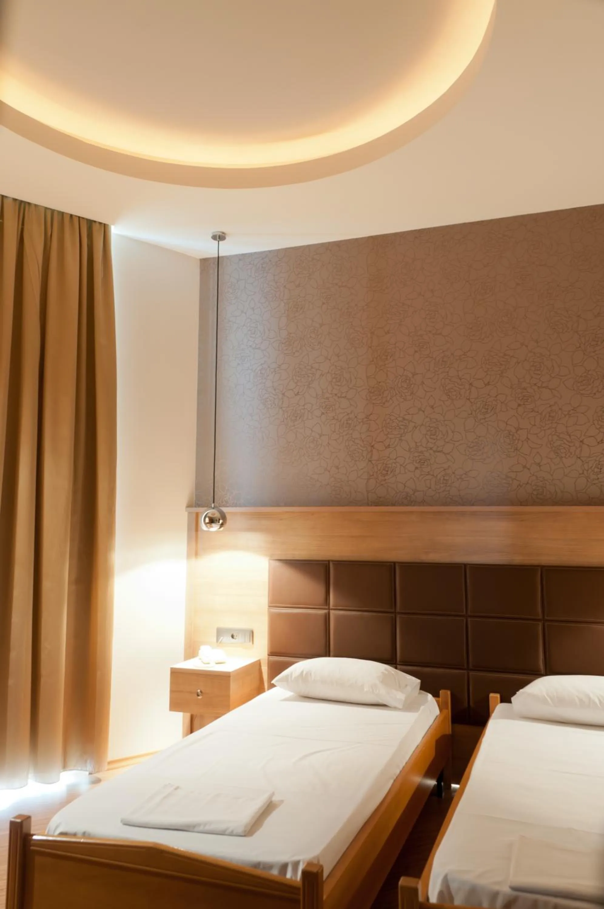 Bed in Metropolis Hotel