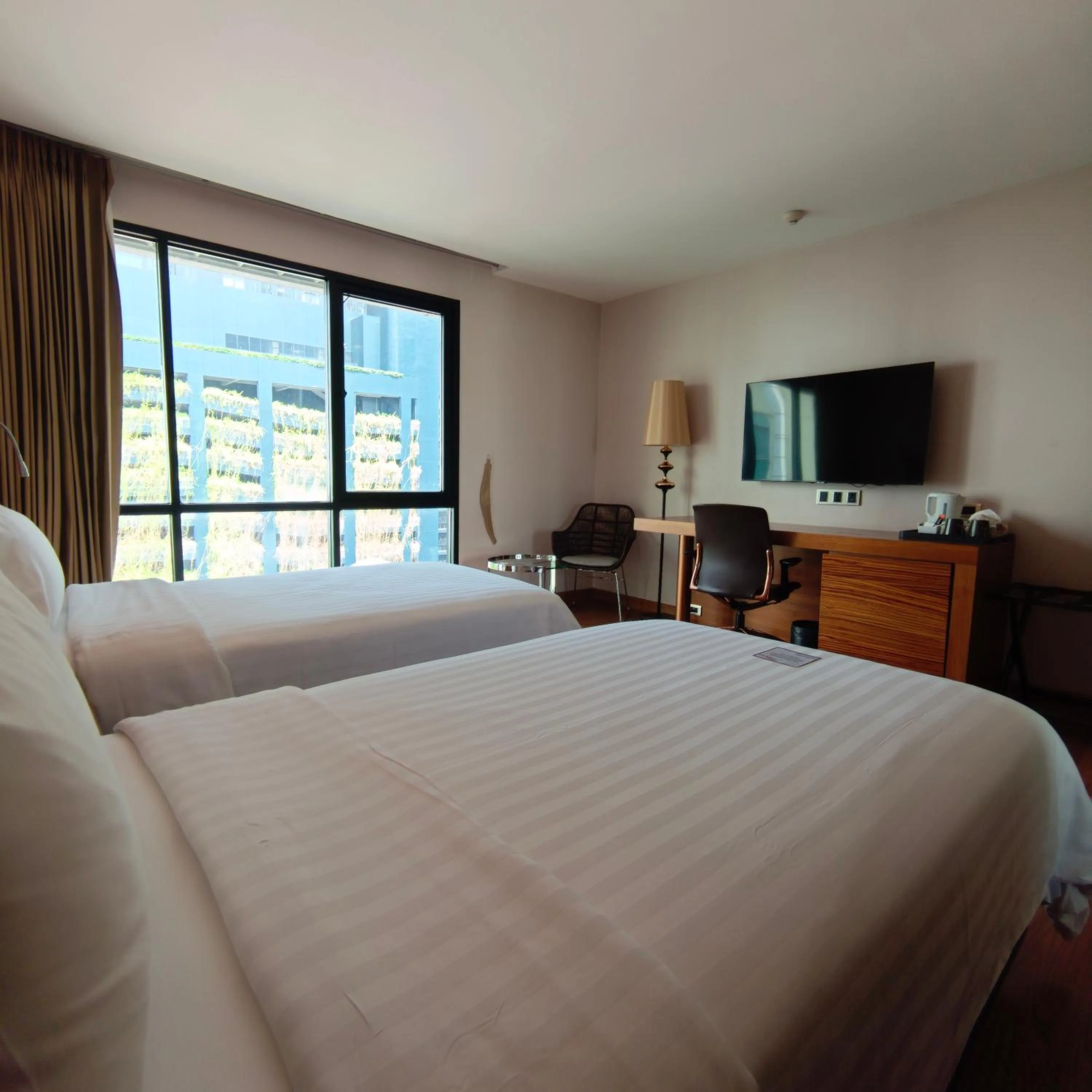 Bed in Sacha's Hotel Uno