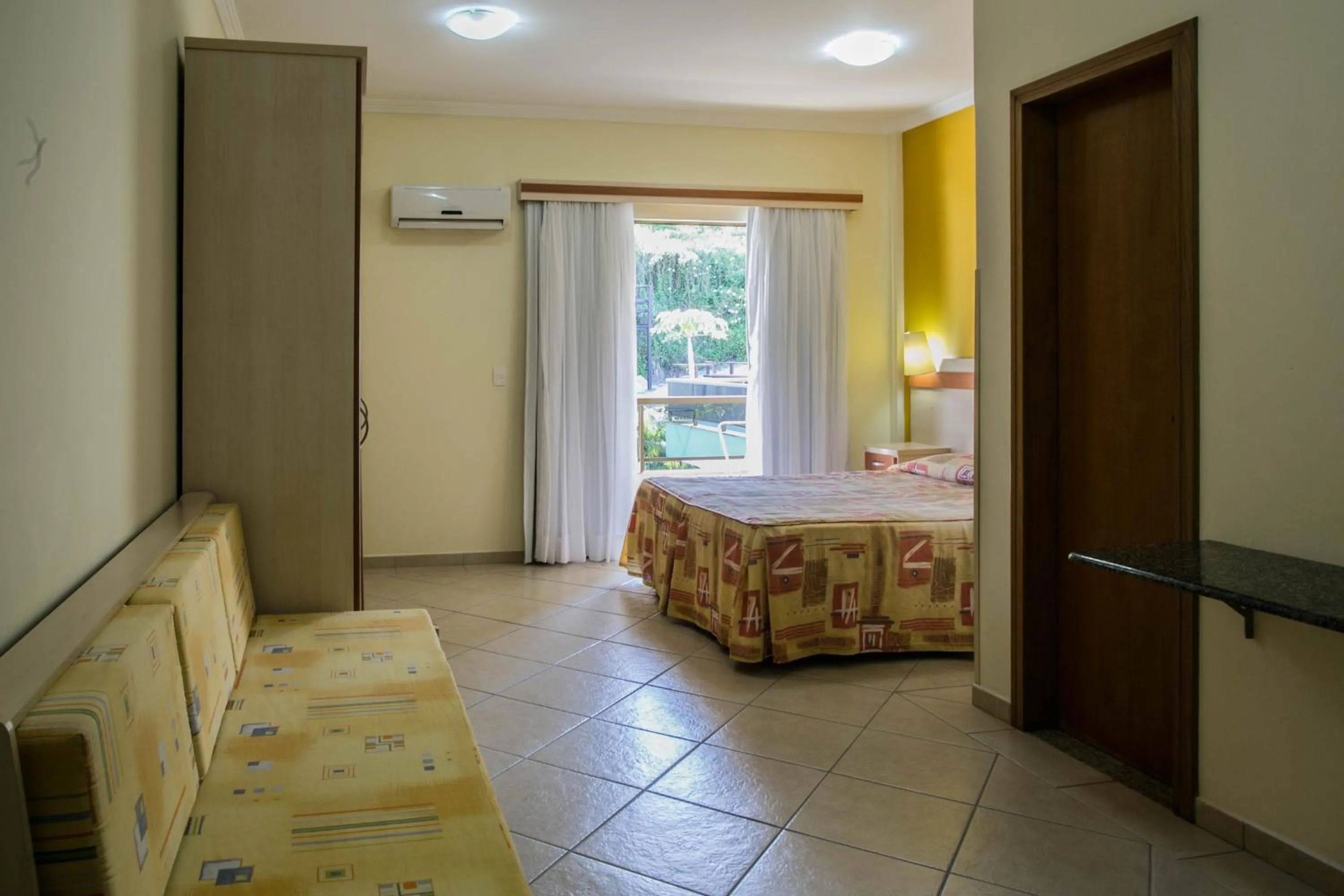 Photo of the whole room, Bed in Refúgio Costeiro II