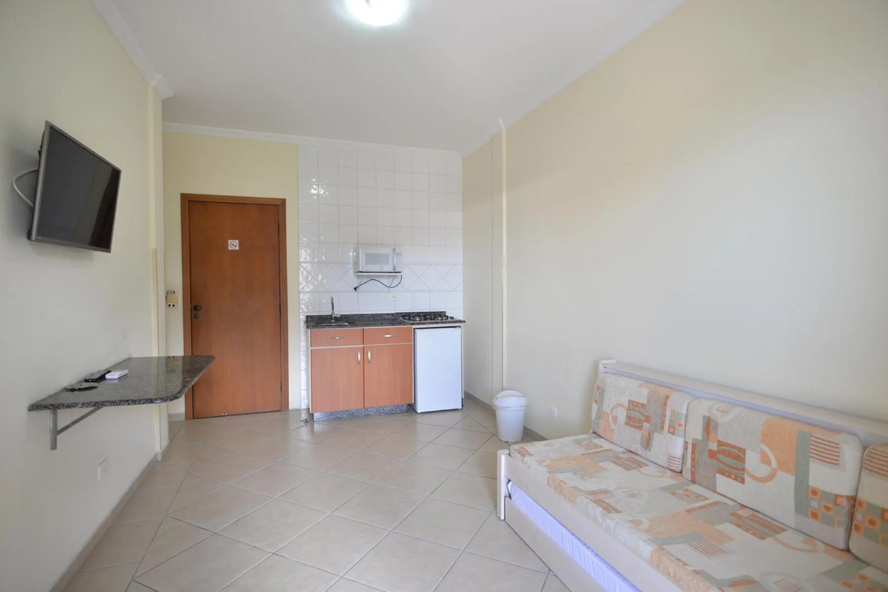 Living room, Bed in Refúgio Costeiro II