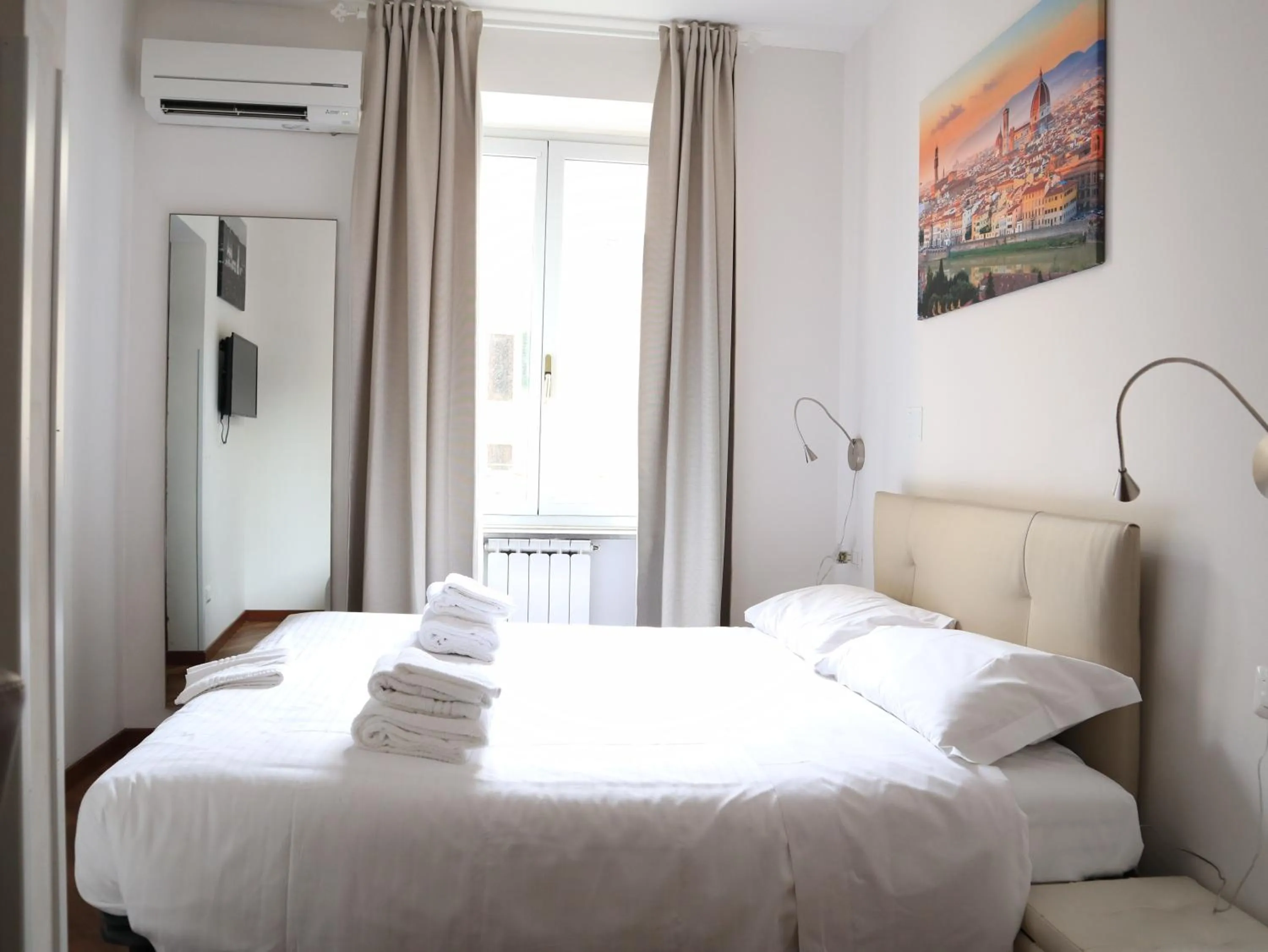 Bed in Le Tre Lune Suites