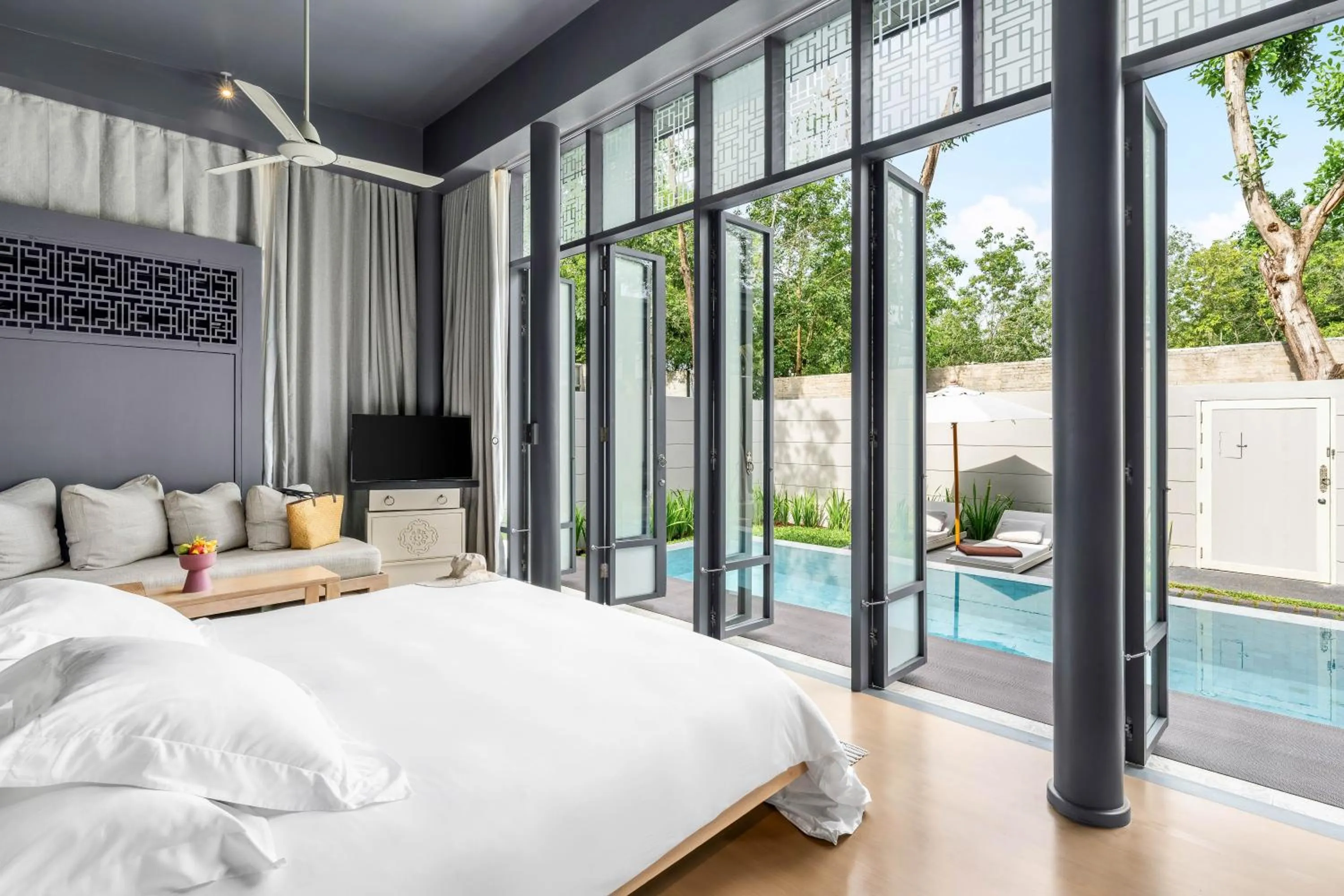 Bed in SALA Phuket Mai Khao Beach Resort