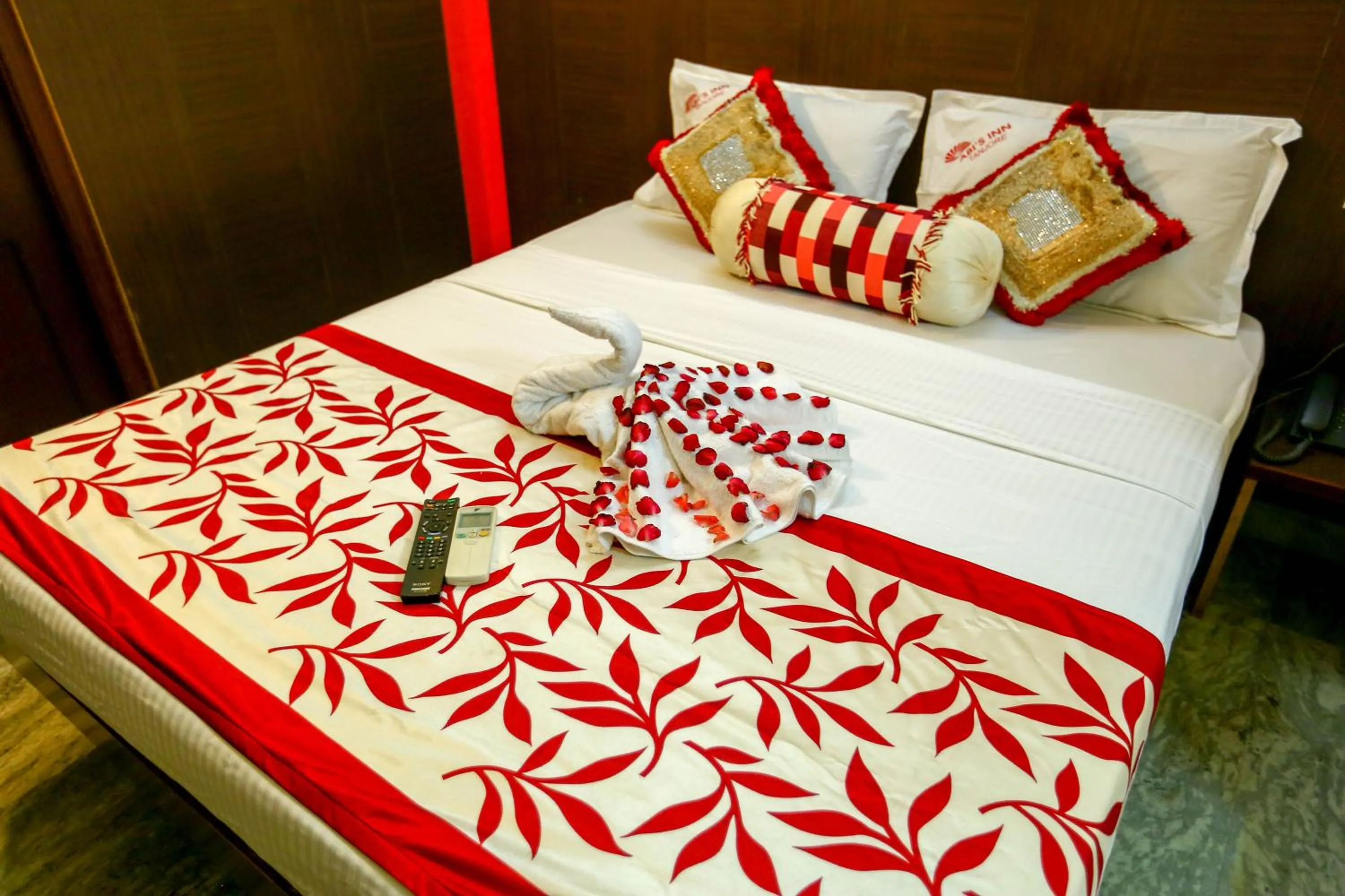 Bed in Hotel Abi's Inn