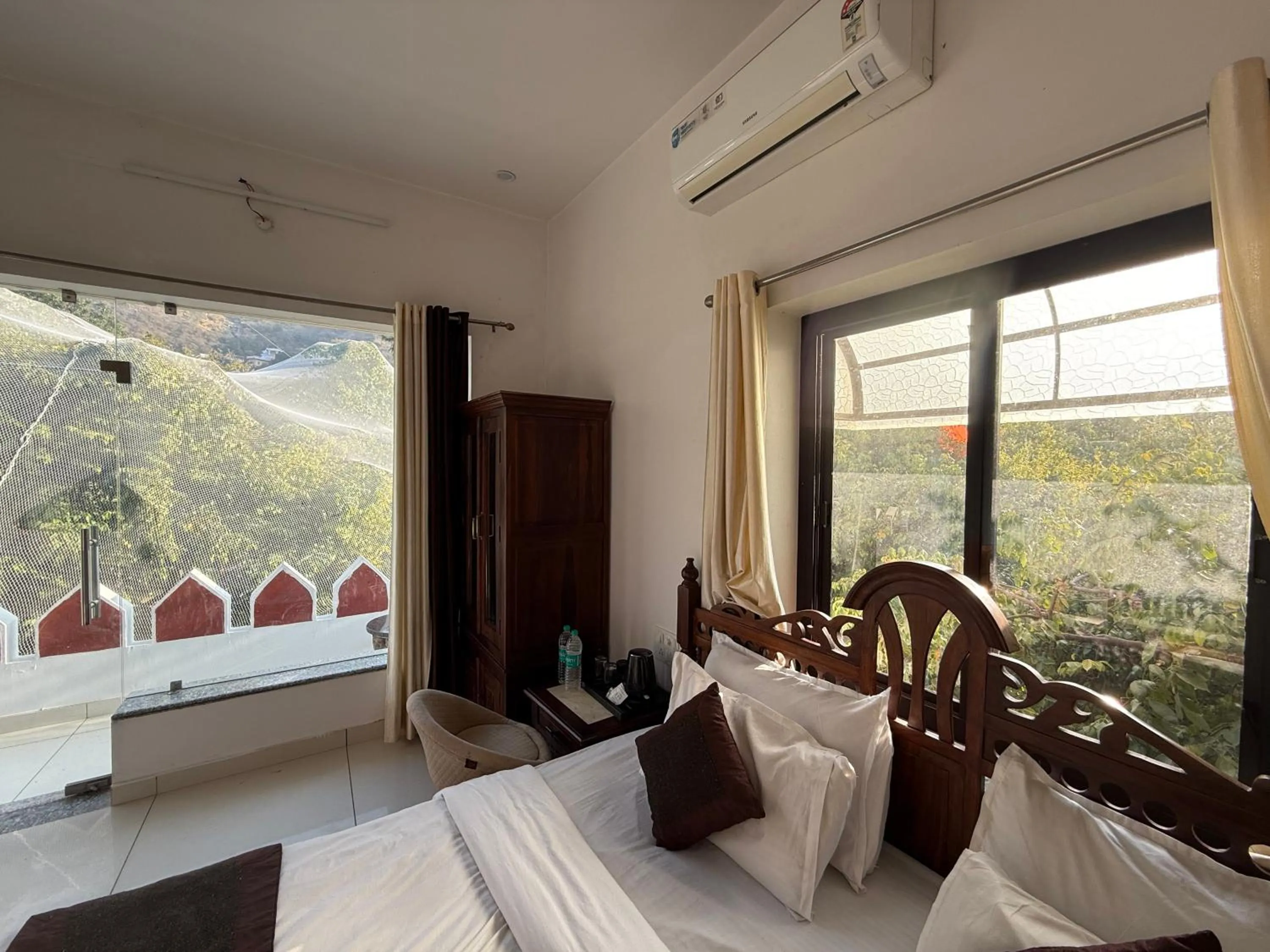 Bed in Hotel Green Heaven Resort