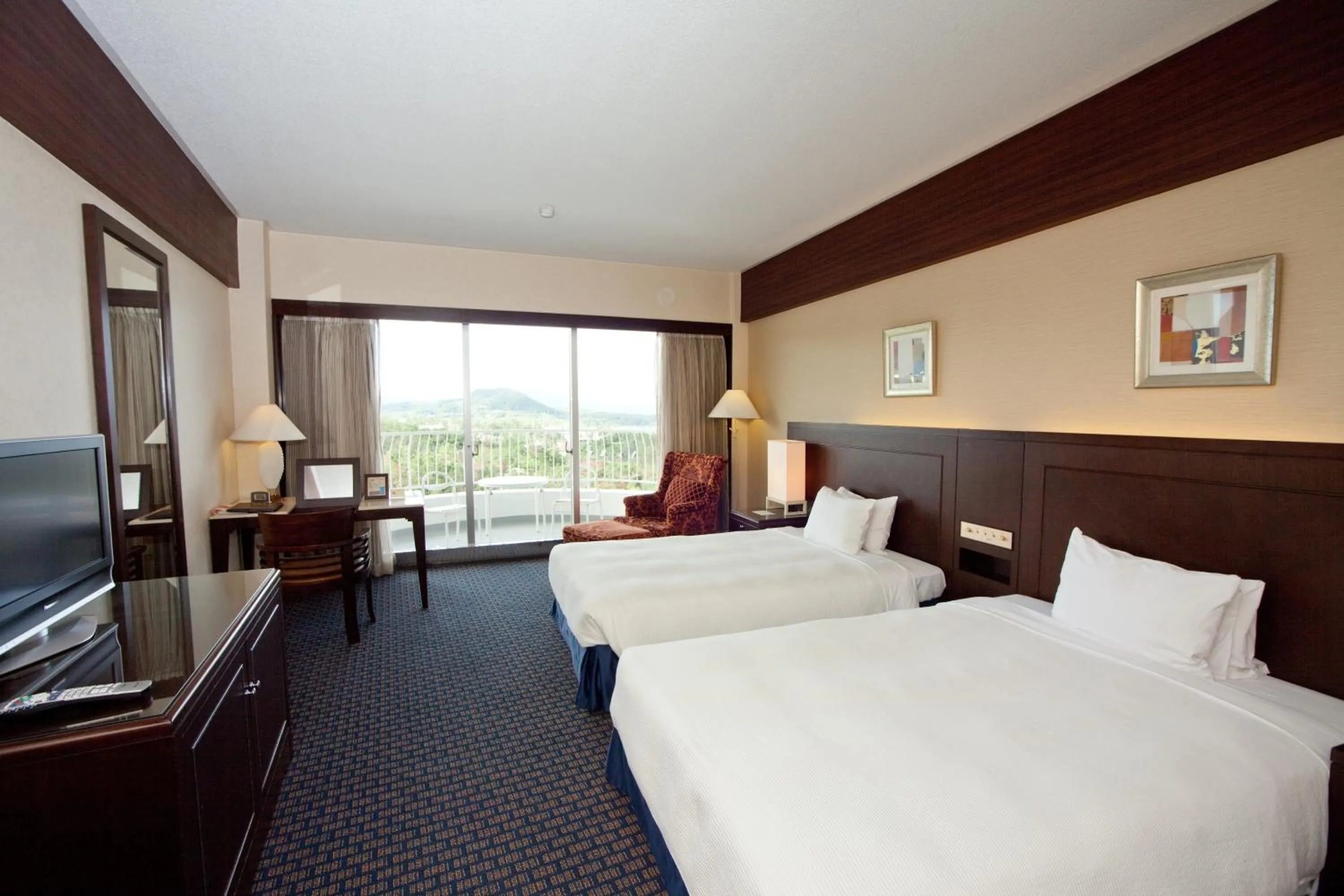 Living room, Bed in Okinawa Kariyushi Beach Resort Ocean Spa